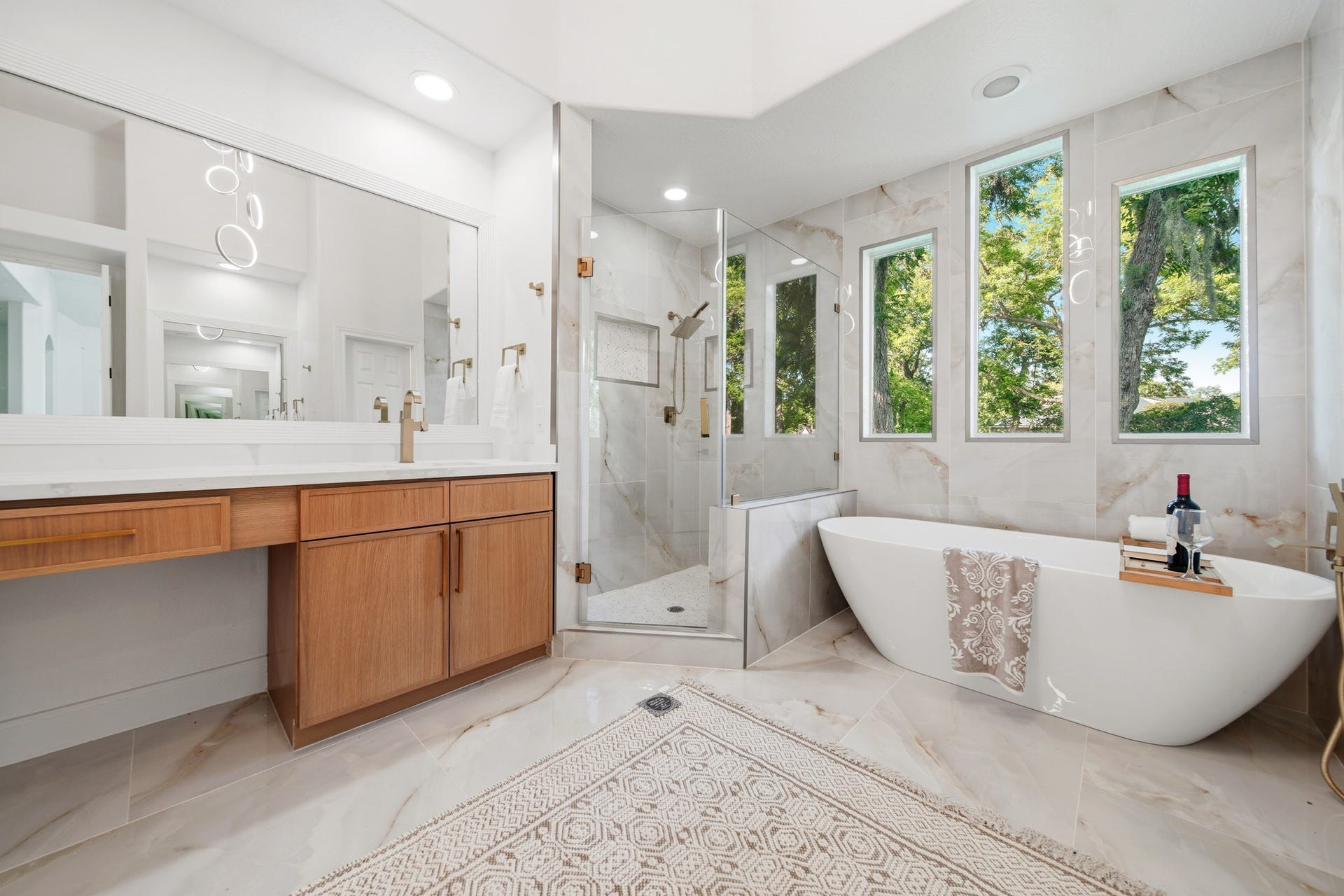 15 Bees Creek Court, Missouri City, TX 77459 Resort-style bathroom showcasing elegant finishes, natural light, and modern luxury.