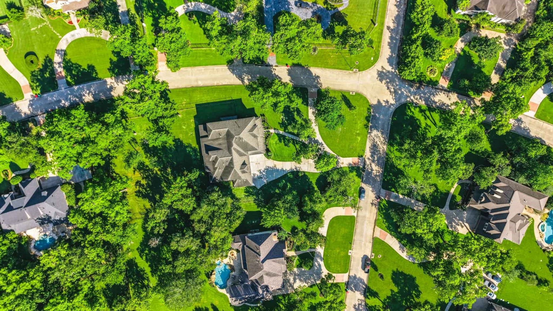 15 Bees Creek Court, Missouri City, TX 77459 Breathtaking AERIAL VIEWS showcase this stunning custom estate nestled on 1.23 wooded acres in the front of Sienna.