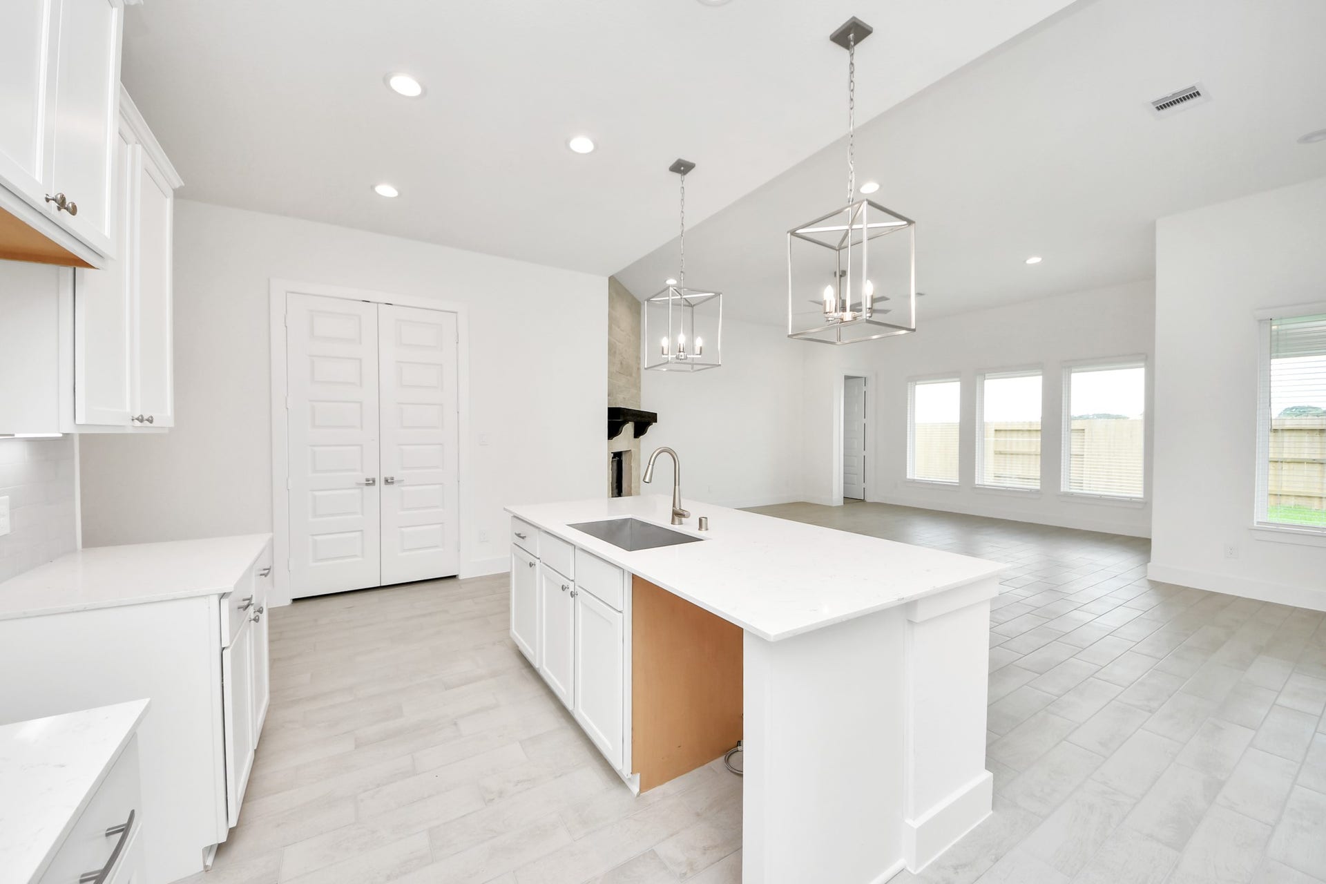 24747 Skerne Woods Drive, Spring, TX 77373 All of this overlooks your expansive family room, creating a perfect space for culinary delights and family gatherings. Sample photo of completed home with similar floor plan. Actual colors and selections may vary.