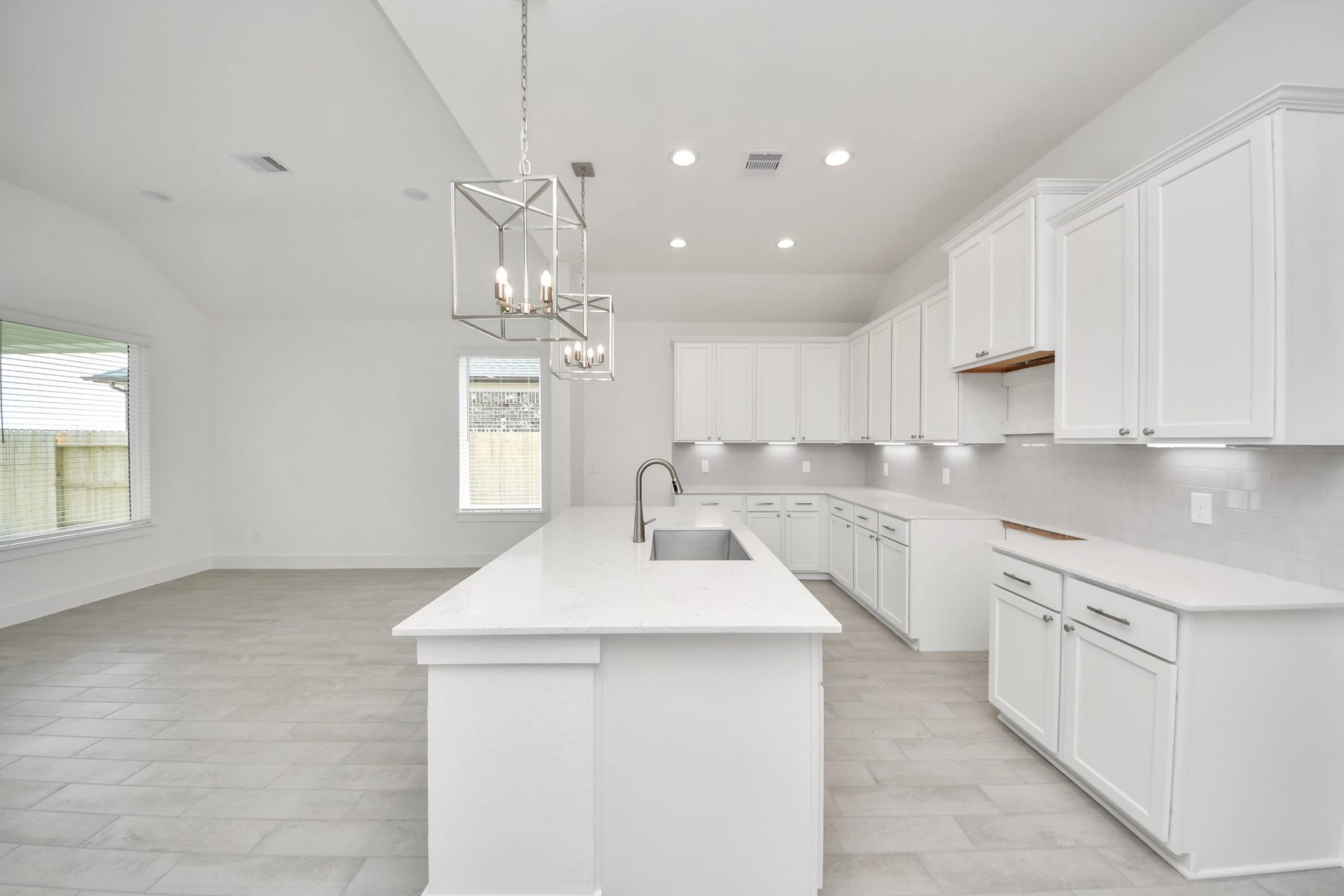 24747 Skerne Woods Drive, Spring, TX 77373 The extended counter area adds both practicality and style, making meal preparation a breeze. Every detail is thoughtfully designed to enhance the kitchen's functionality and aesthetic appeal. Sample photo of completed home with similar floor plan. Actual colors and selections may vary.