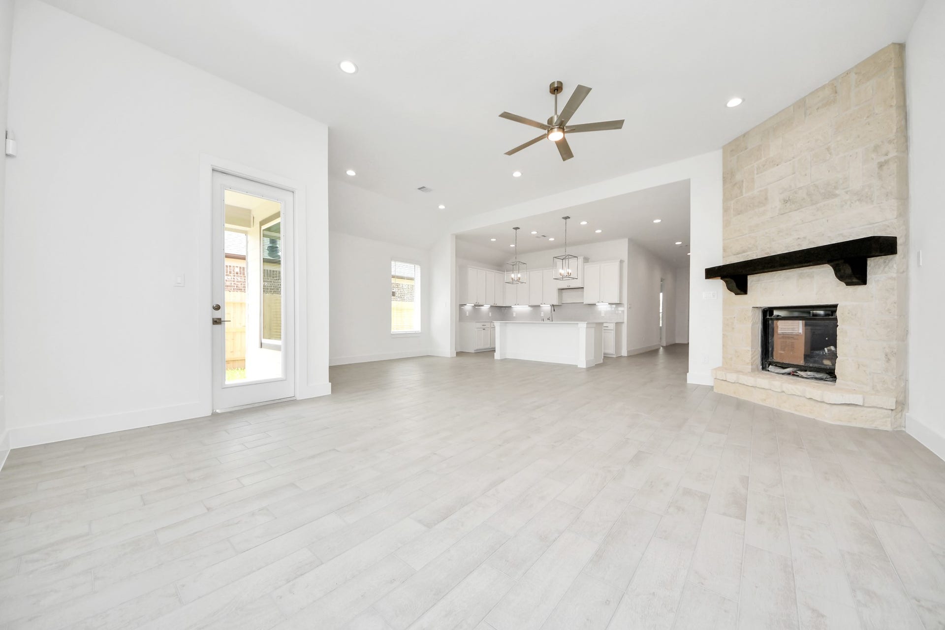 24747 Skerne Woods Drive, Spring, TX 77373 Take another glimpse into the heart of the home with this additional view of the family rooma sprawling space ready to accommodate all your gatherings. Sample photo of completed home with similar floor plan. Actual colors and selections may vary.