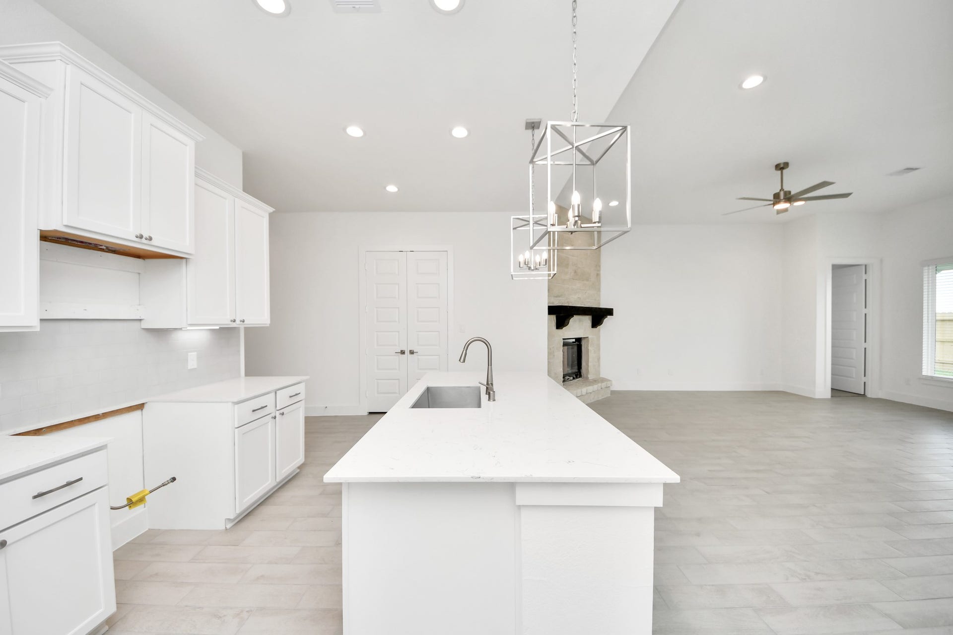 24747 Skerne Woods Drive, Spring, TX 77373 This generously spacious kitchen is a dream realized! Sample photo of completed home with similar floor plan. Actual colors and selections may vary.