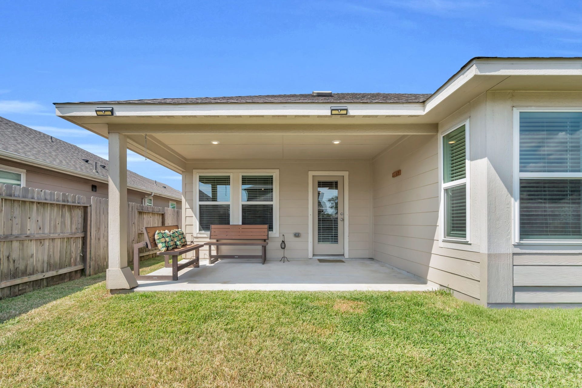 2315 Scarlett Pine Bend, Tomball, TX 77375 Complete look at the covered patio that is perfect for relaxing outdoors.