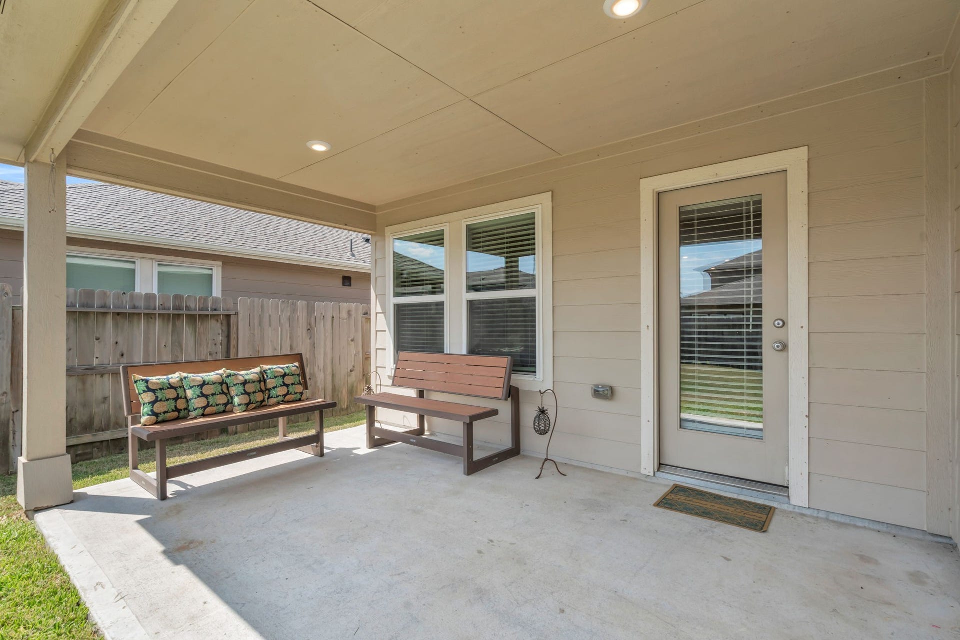 2315 Scarlett Pine Bend, Tomball, TX 77375 Step outside to the backyard with a covered patio.