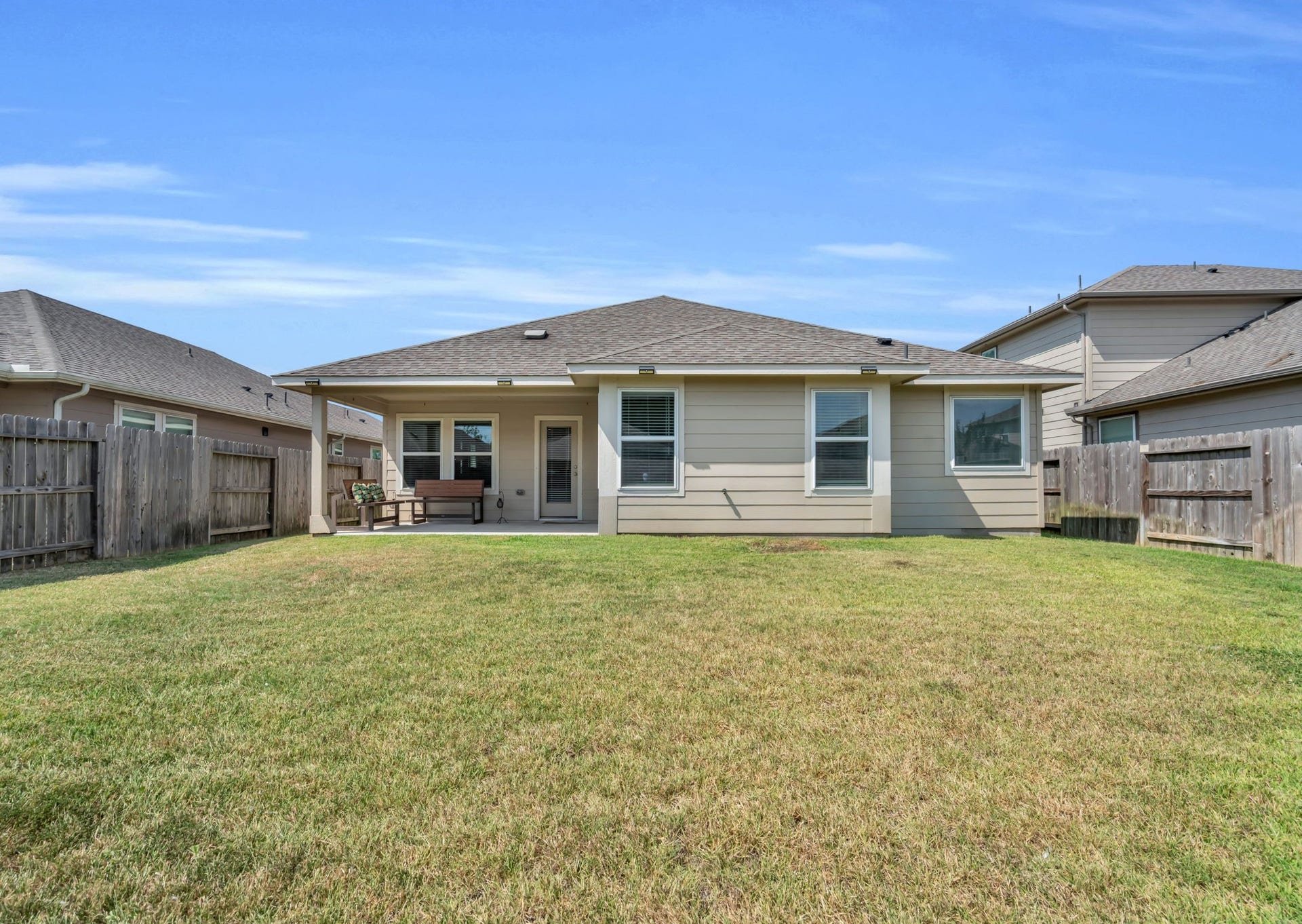2315 Scarlett Pine Bend, Tomball, TX 77375 Full view of this backyard with tons of green space.