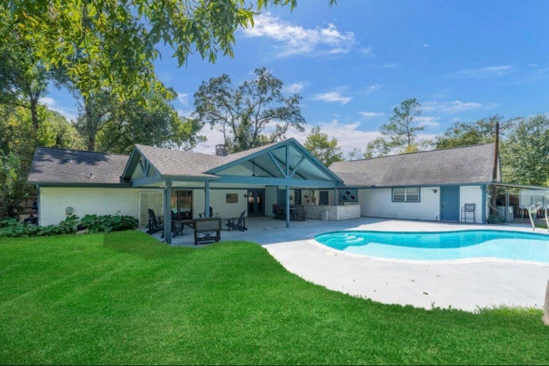 12710 Mutiny Lane, Tomball, TX 77377 Private pool, covered patio, and outdoor kitchen create an inviting backyard retreat. Landlord provides pool maintenance.