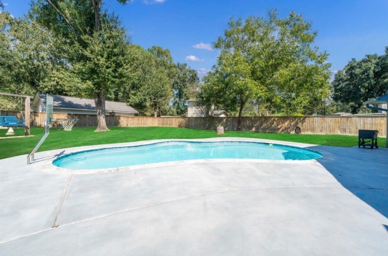 12710 Mutiny Lane, Tomball, TX 77377 Enjoy a private backyard pool with maintenance provided by the landlord.
