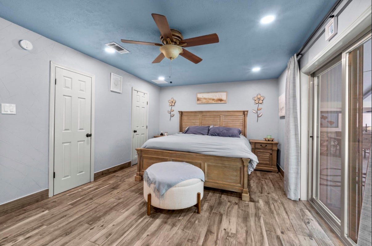 12710 Mutiny Lane, Tomball, TX 77377 Another view of the spacious primary bedroom and its closet doors.