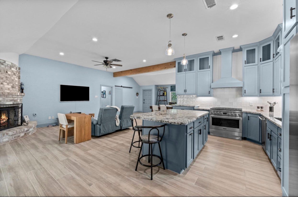 12710 Mutiny Lane, Tomball, TX 77377 The island kitchen opens directly to the living room for easy everyday gathering.