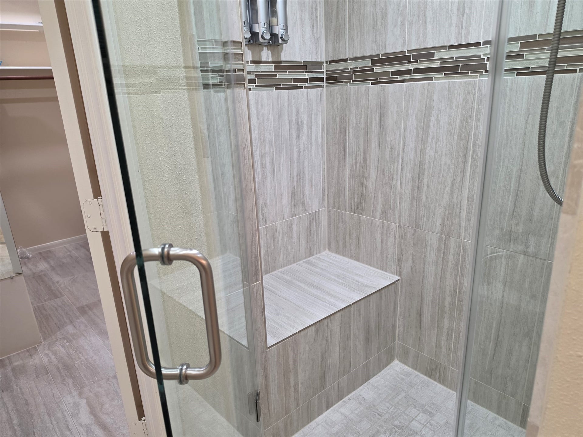 22902 Greenrush Drive, Katy, TX 77494 REMODELLED SHOWER WITH SAFETY SEAT & FRAMELESS DOOR