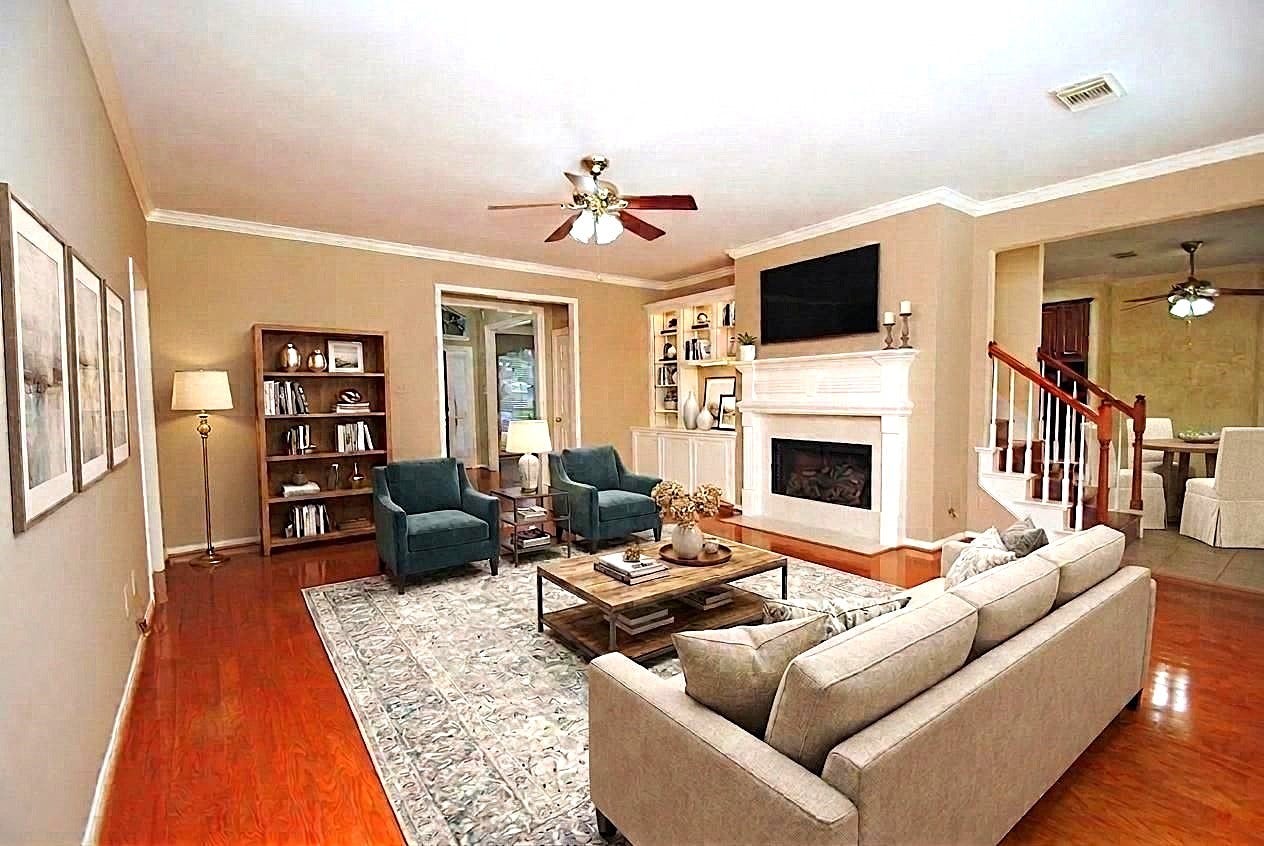 22902 Greenrush Drive, Katy, TX 77494 HUNTER FANS, WOOD FLOORS, CROWN MOLDING, CUSTOM MANTLE.