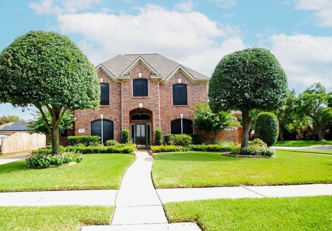 22902 Greenrush Drive, Katy, TX 77494 STUNNING HOME WITH GREAT CURB APPEAL LARGE CORNER LOT