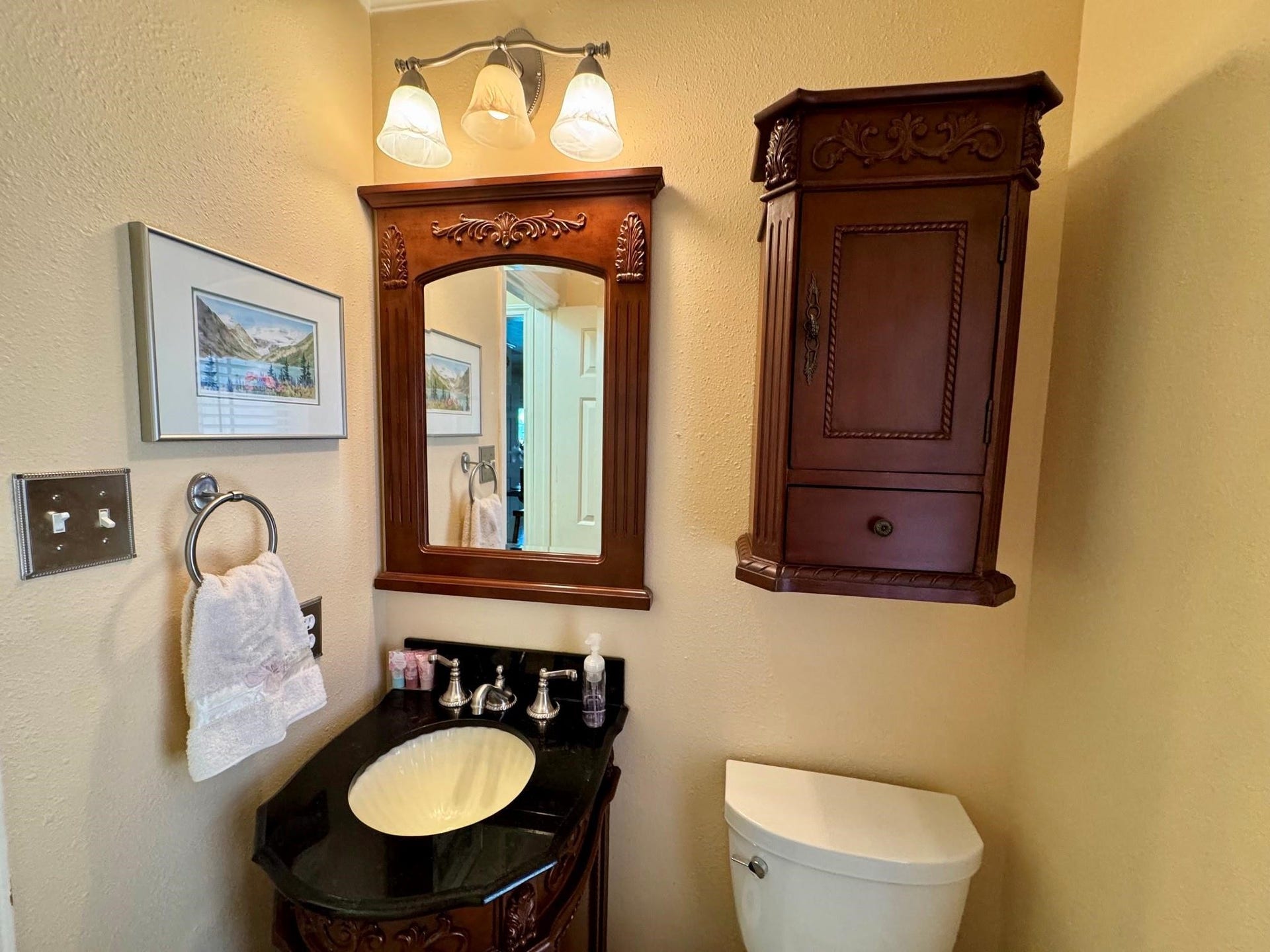 22902 Greenrush Drive, Katy, TX 77494 LOVELY REMODELED POWDER ROOM IS DISCREETLY LOCATED BY THE UTILITY ROOM