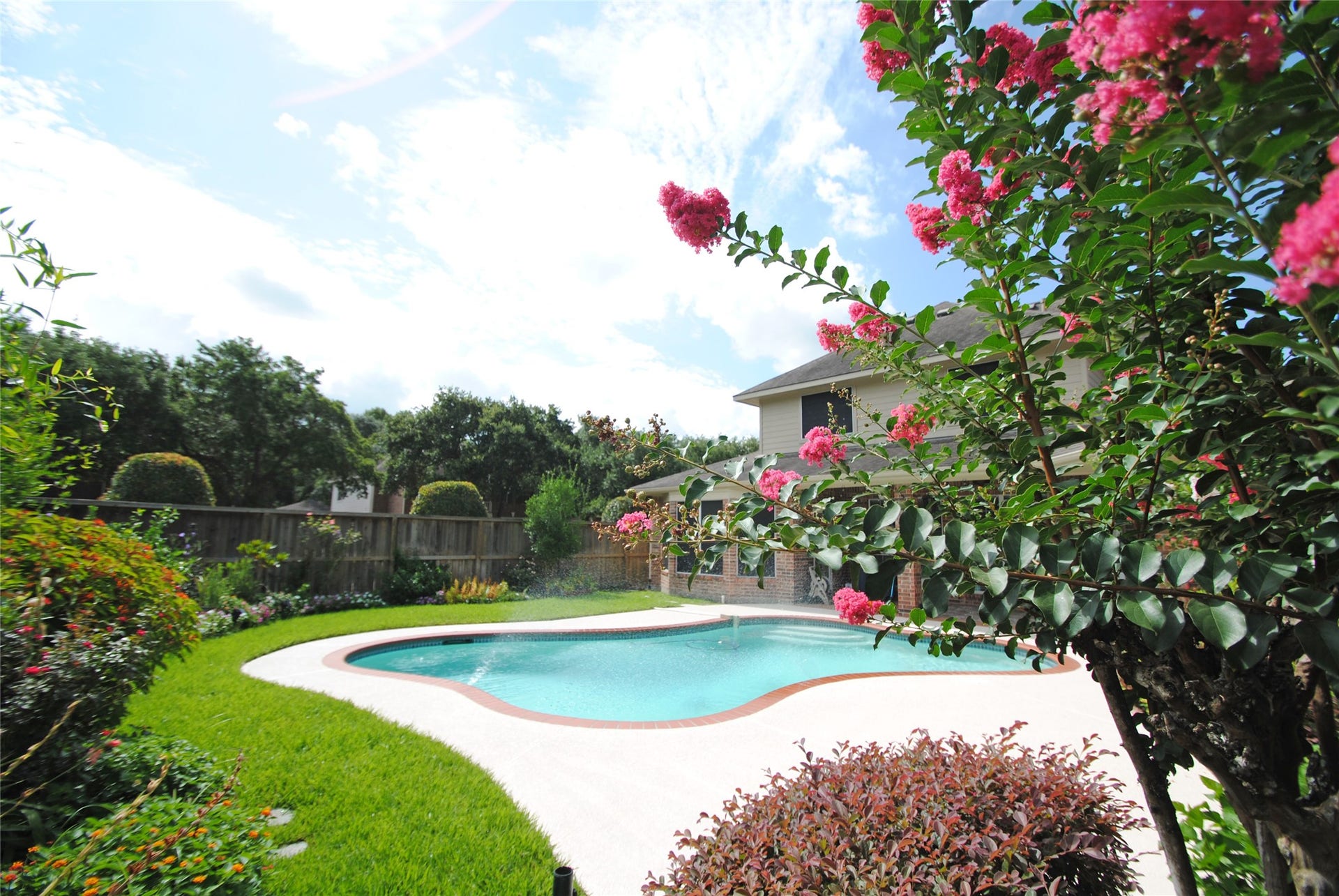 22902 Greenrush Drive, Katy, TX 77494 GORGEOUS VIEWS OF THE POOL & YARD FOR PEACE & TRANQUILITY