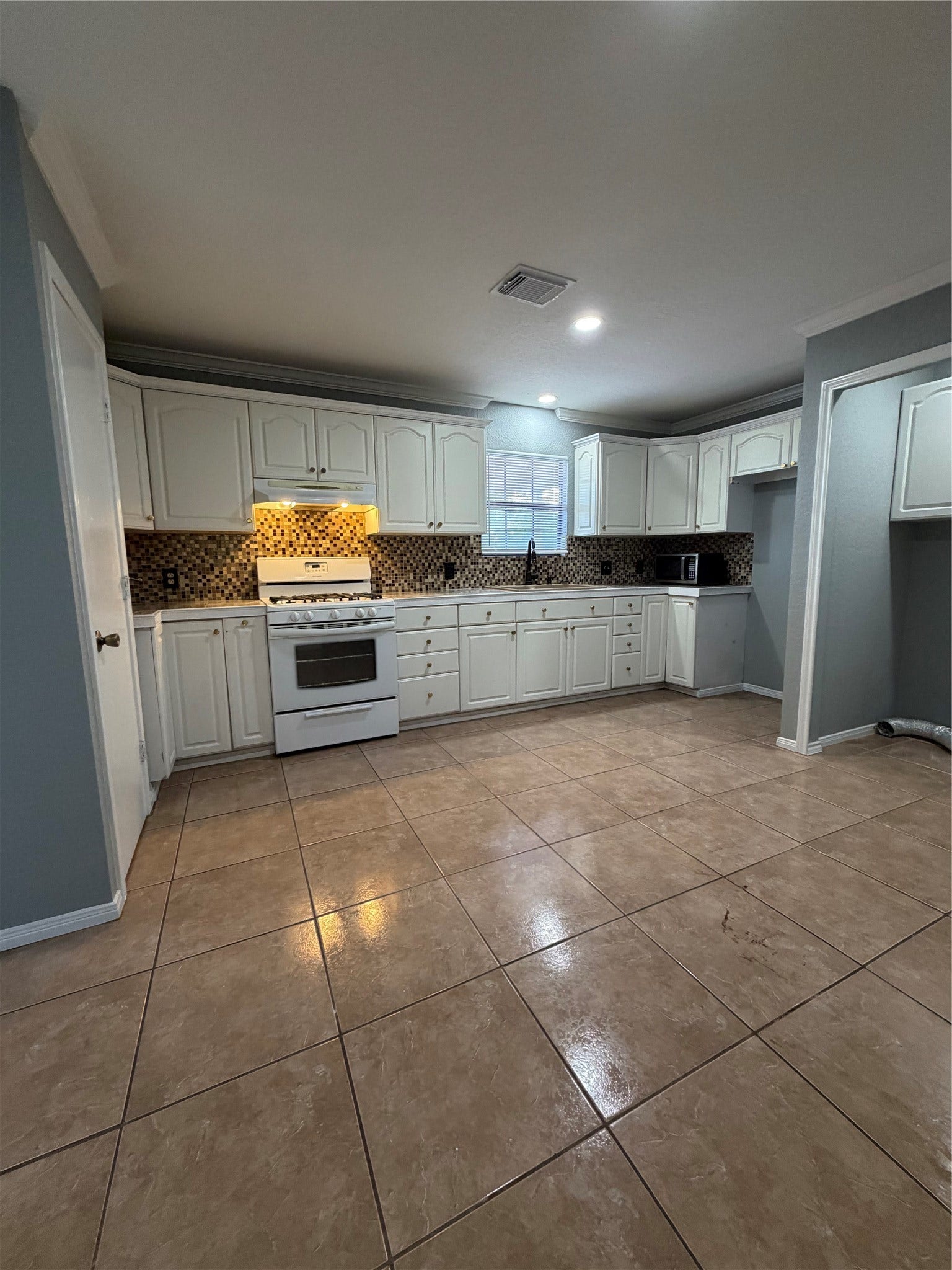 118 1/2 Anita Street, La Marque, TX 77568 Kitchen view.