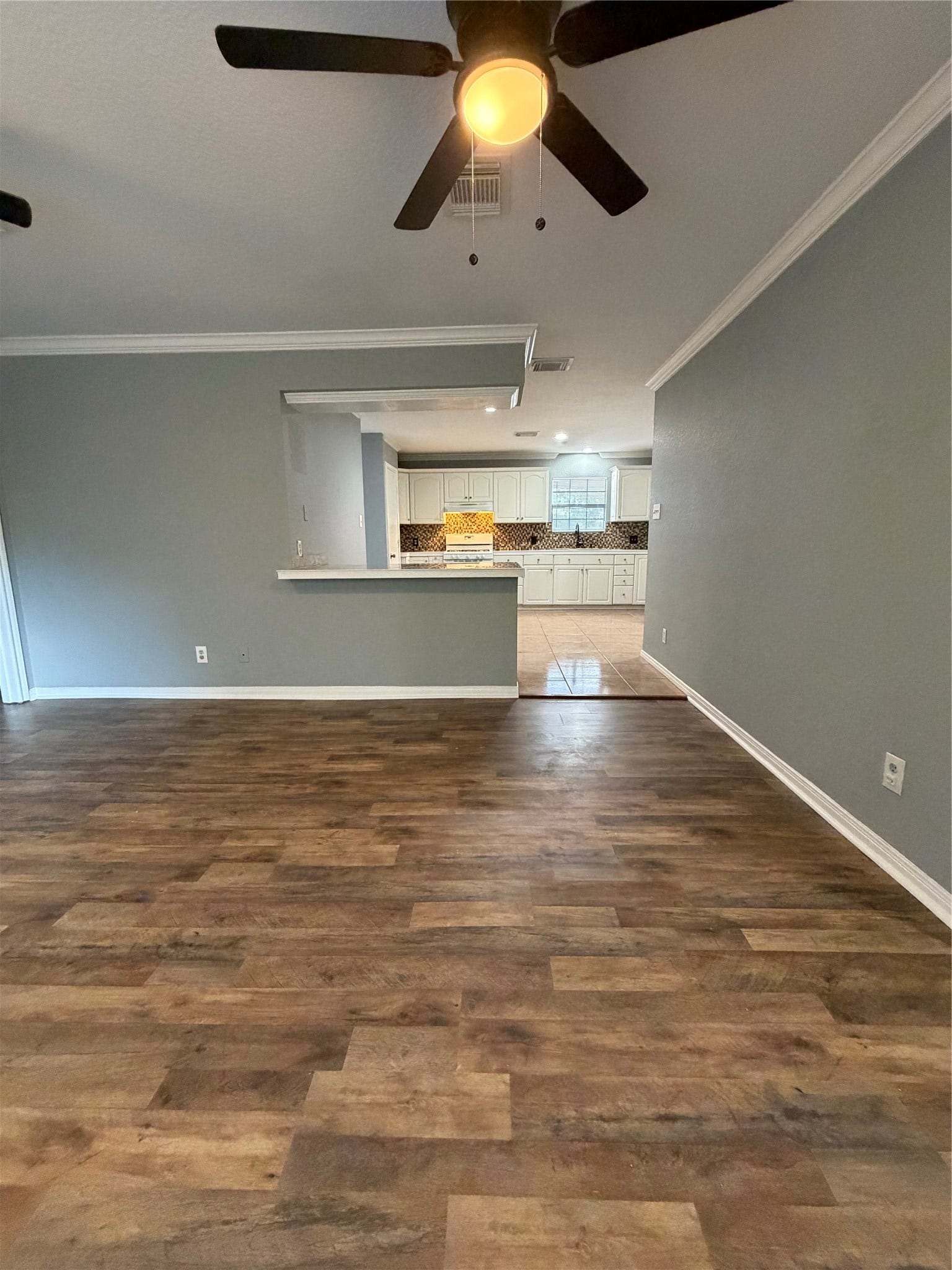 118 1/2 Anita Street, La Marque, TX 77568 Living room open to kitchen.