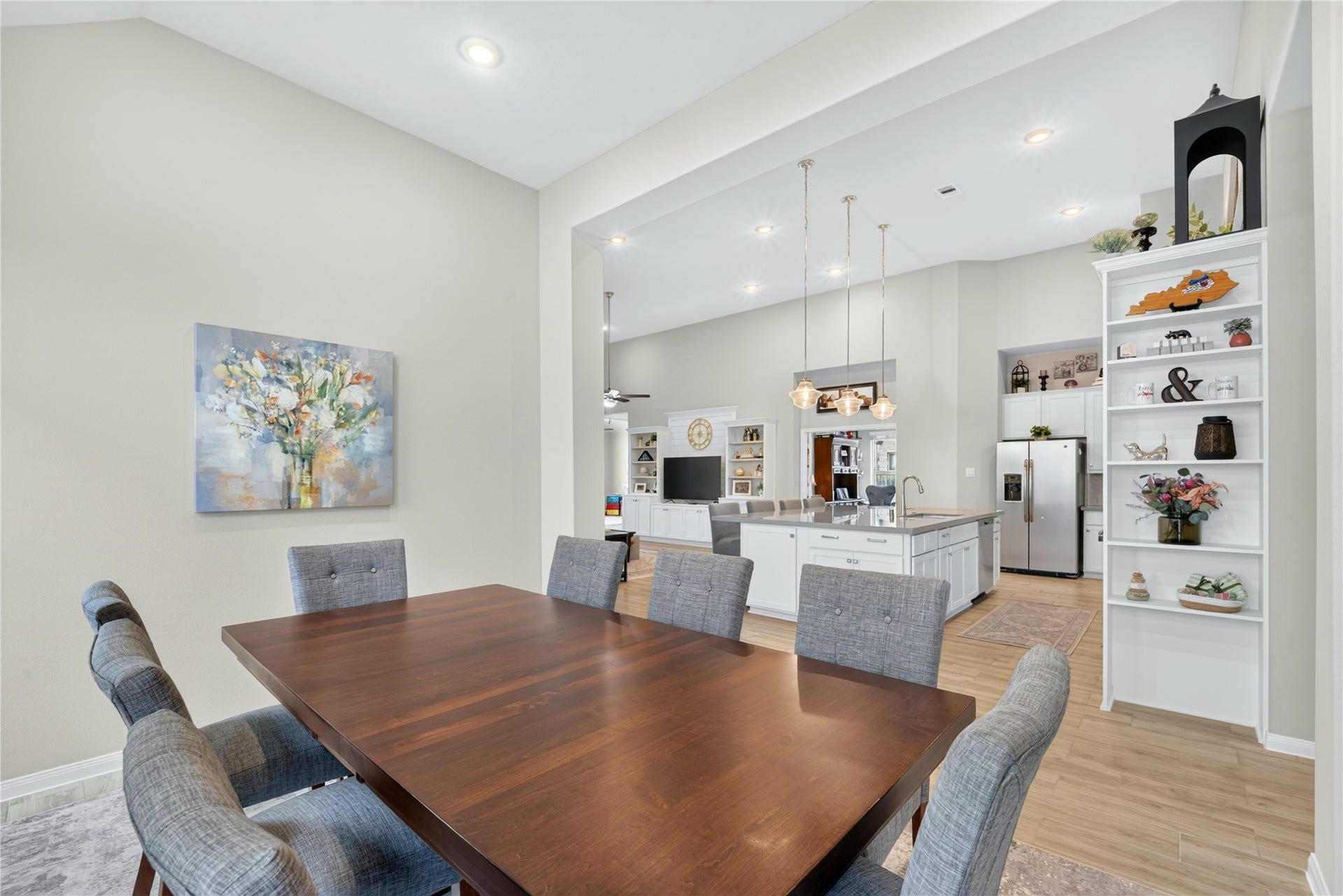 11351 Cosmopolitan Drive, Cypress, TX 77433 The Anson Floor Plan by Coventry Homes is thoughtfully designed for effortless flow and connection. The dining room opens seamlessly toward the kitchen, creating a welcoming space for entertaining.