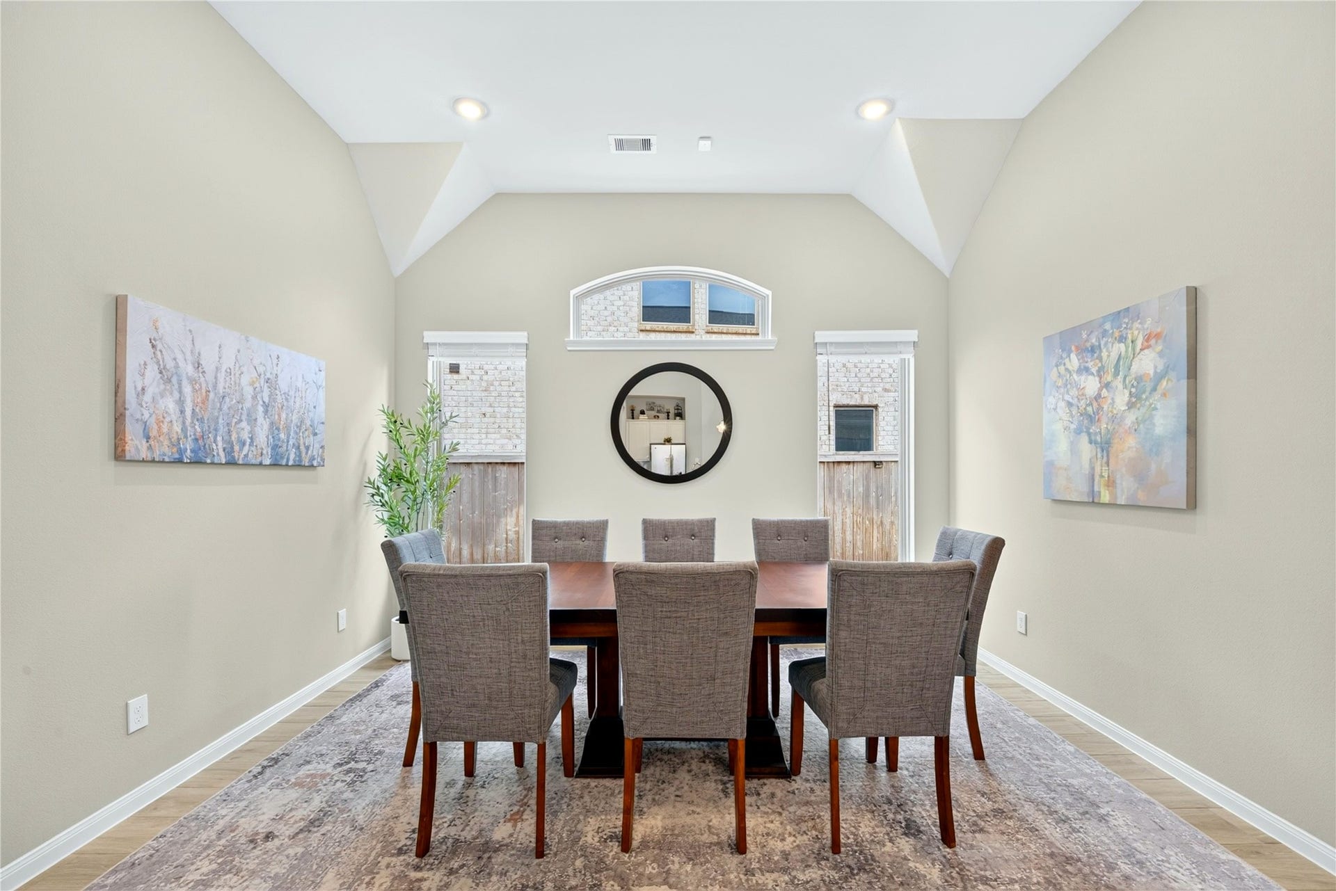 11351 Cosmopolitan Drive, Cypress, TX 77433 The dining room features beautiful windows that fill the space with natural light.