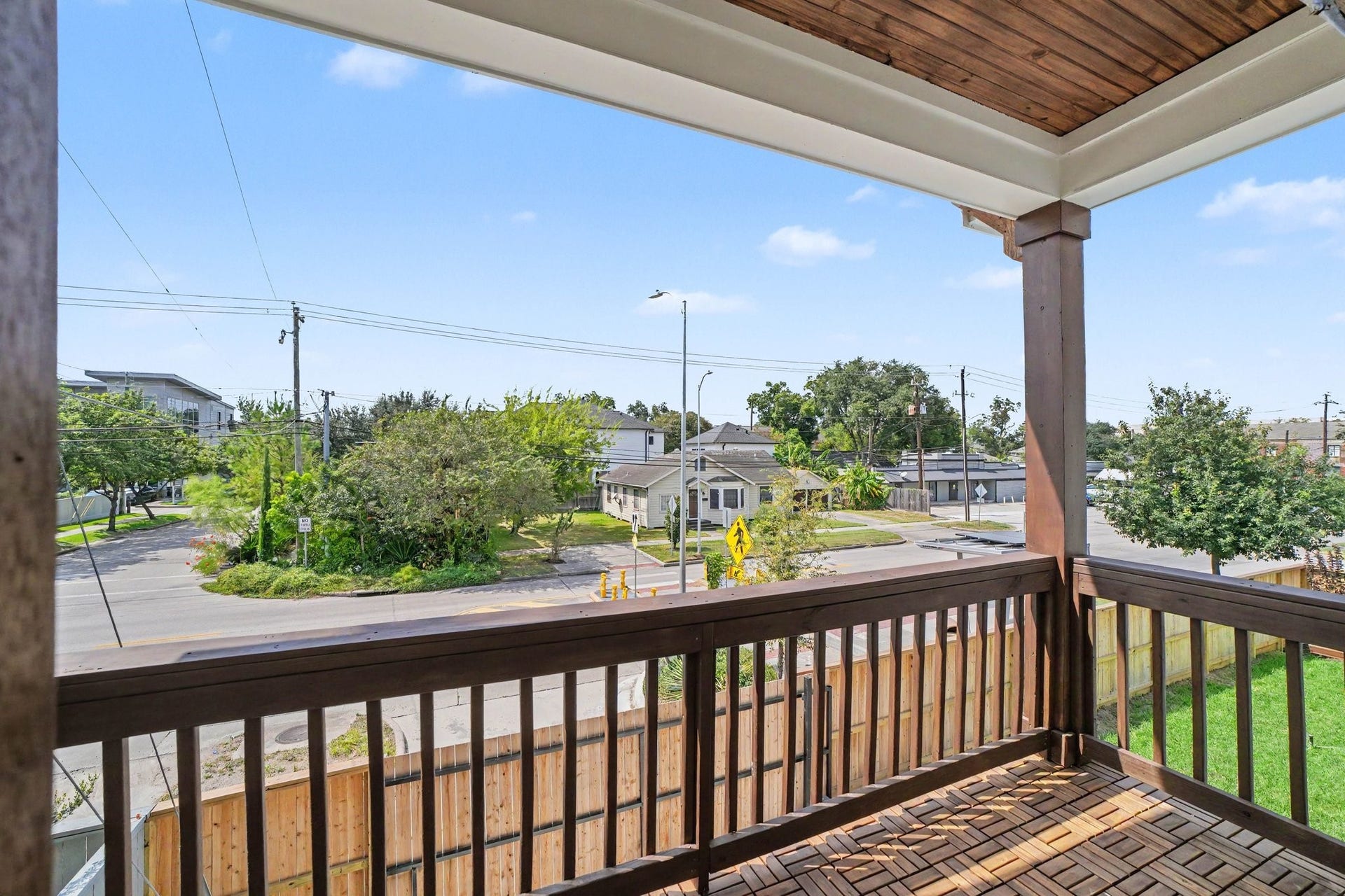 Solid wood French doors lead you out to your private balcony overlooking the property.