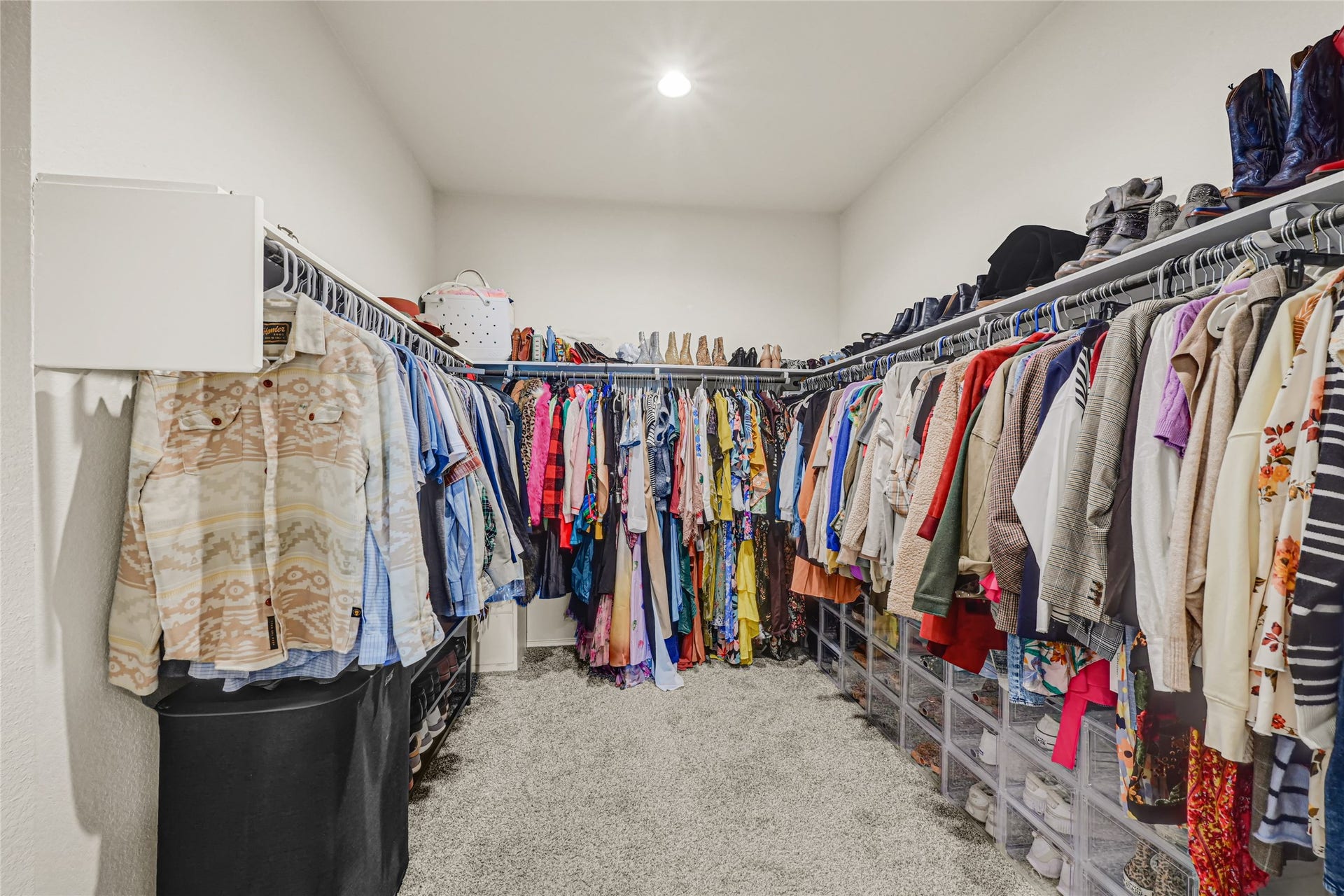 Oversized walk-in closet in the primary bedroom. Not pictured additional storage space to the left!