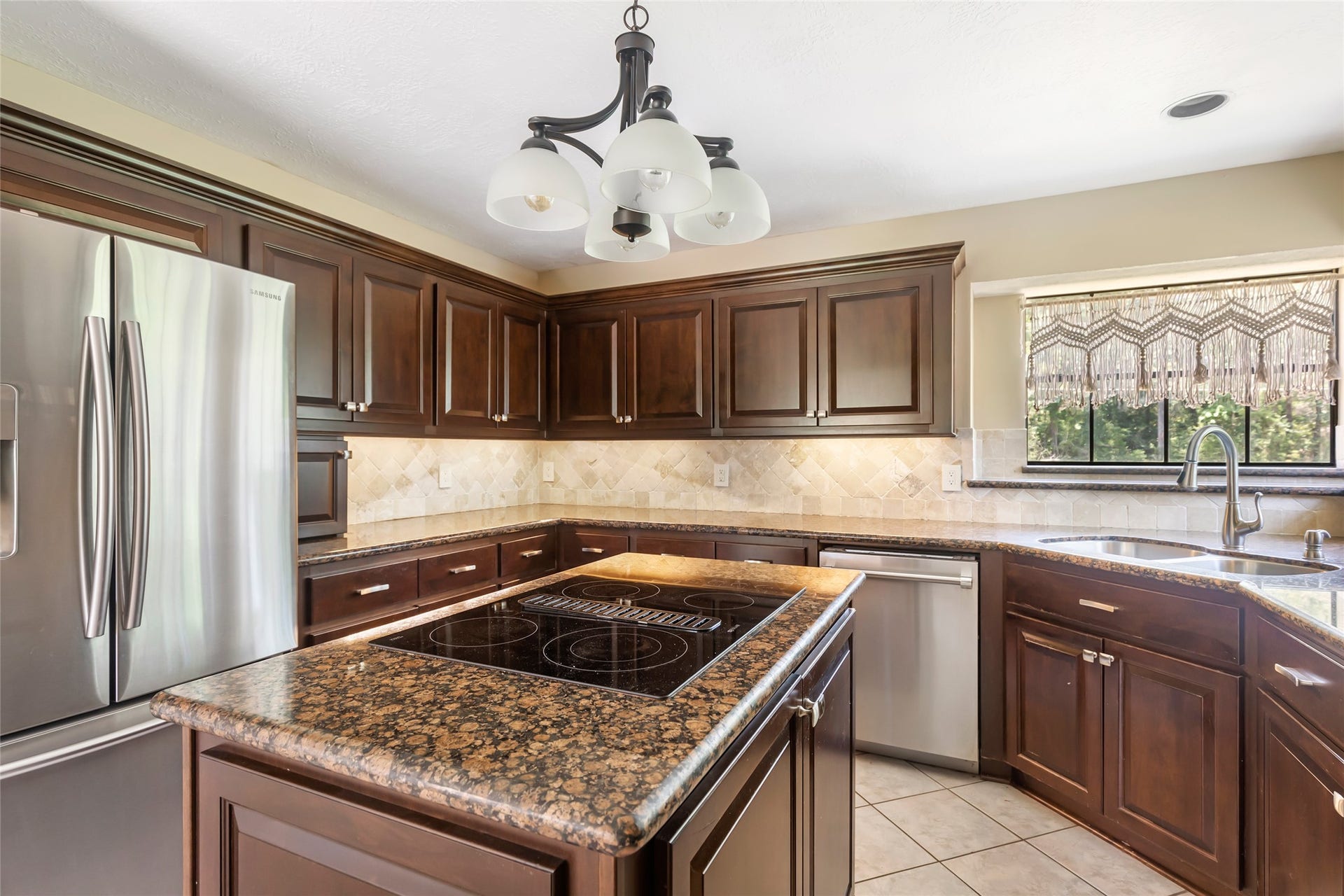 26342 Hill And Dale Avenue, Splendora, TX 77372 Under cabinet lighting with granite countertops.