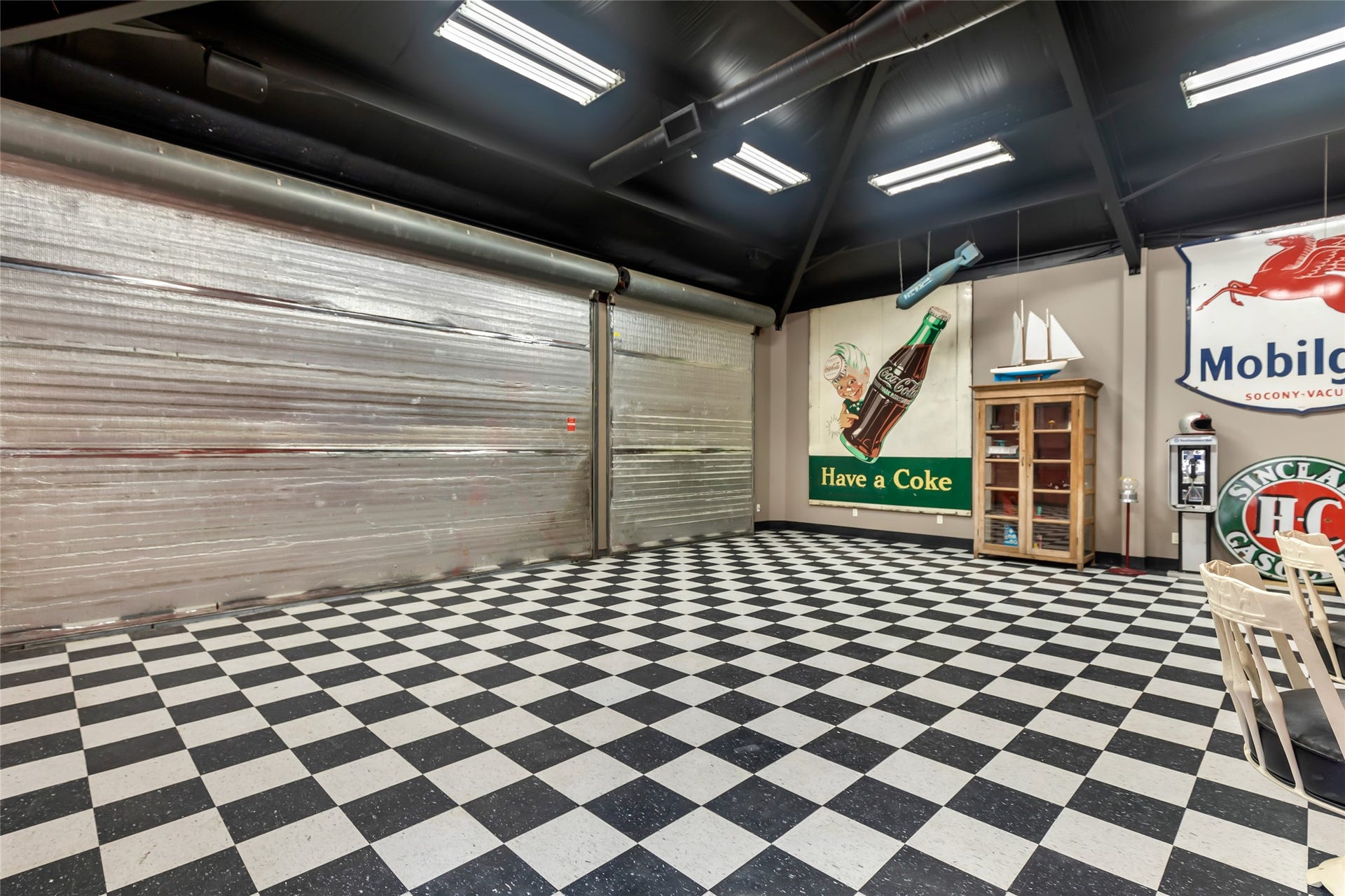 26342 Hill And Dale Avenue, Splendora, TX 77372 Climate controlled garage attached to game room.
