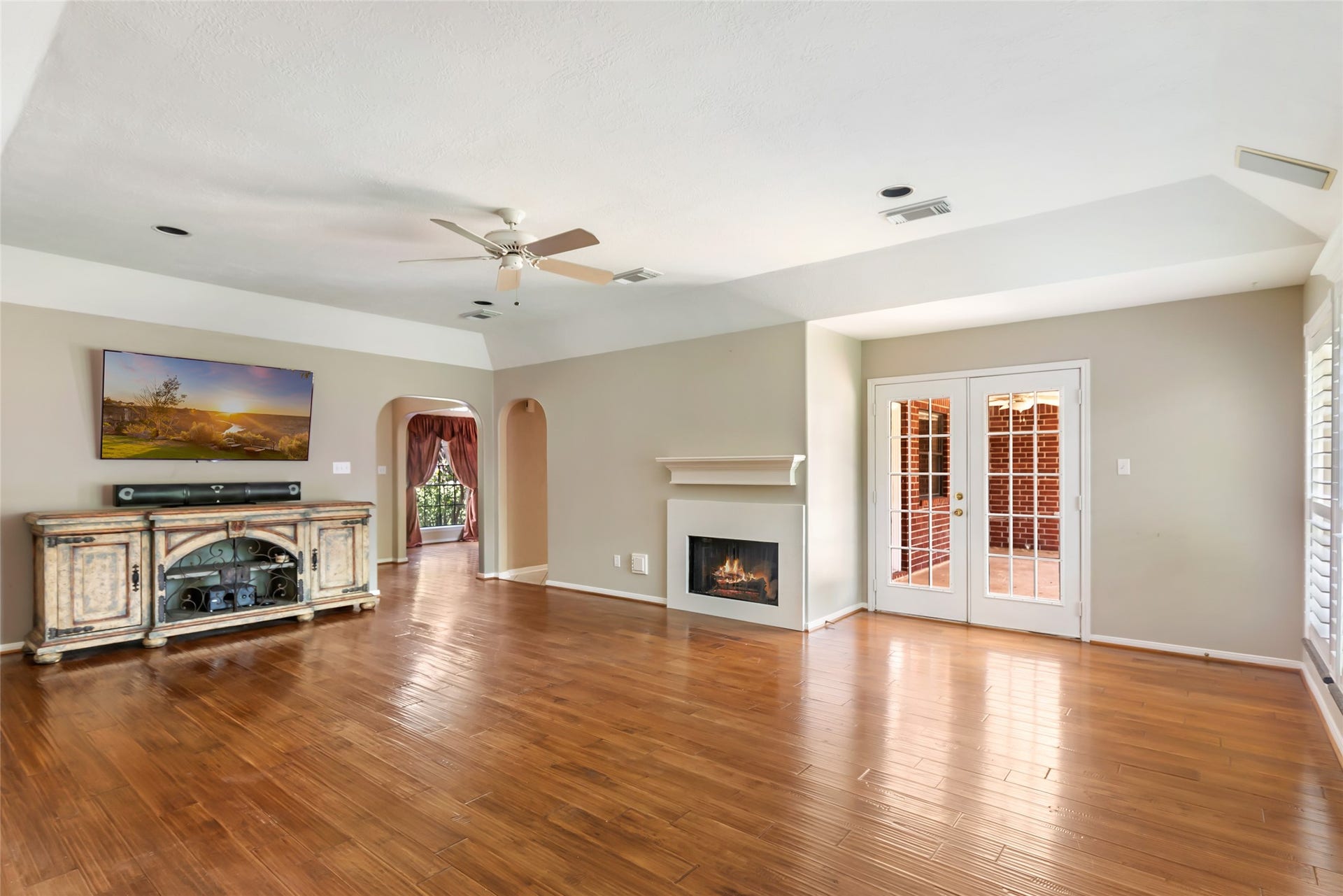 26342 Hill And Dale Avenue, Splendora, TX 77372 Living room with a gas log fireplace.
