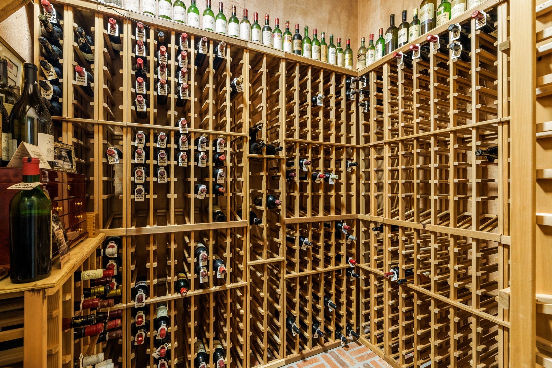 2820 Ferndale Street, Houston, TX 77098 600+ Bottle Refrigerated Wine Cellar: Racking and climate-control systems keep your private collection preserved at proper temperatures. Situated conveniently off the primary gallery for tasting and service.