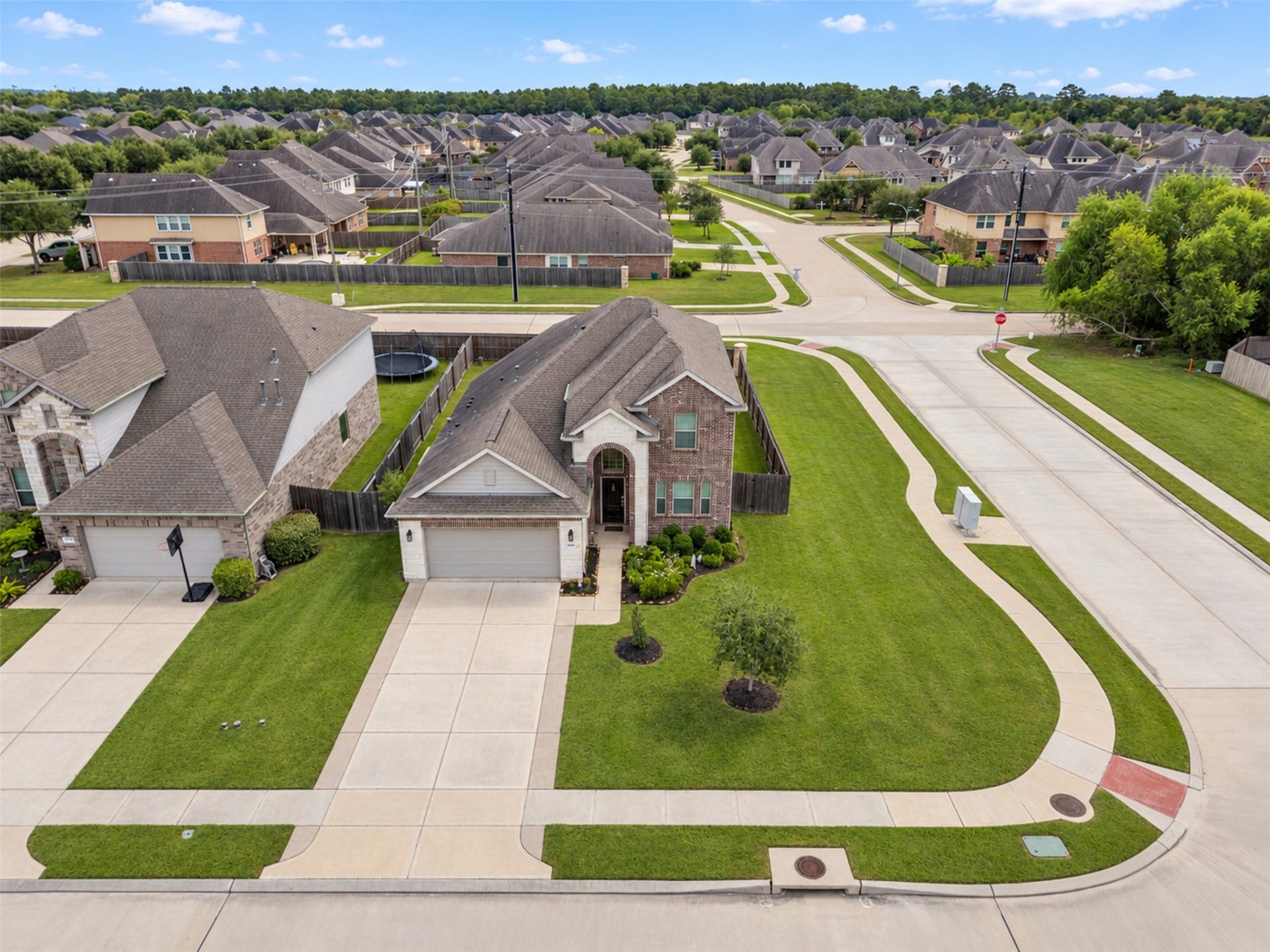 4341 Mocking Run Lane, Dickinson, TX 77539 This home sits on a large corner lot with no back neighbors