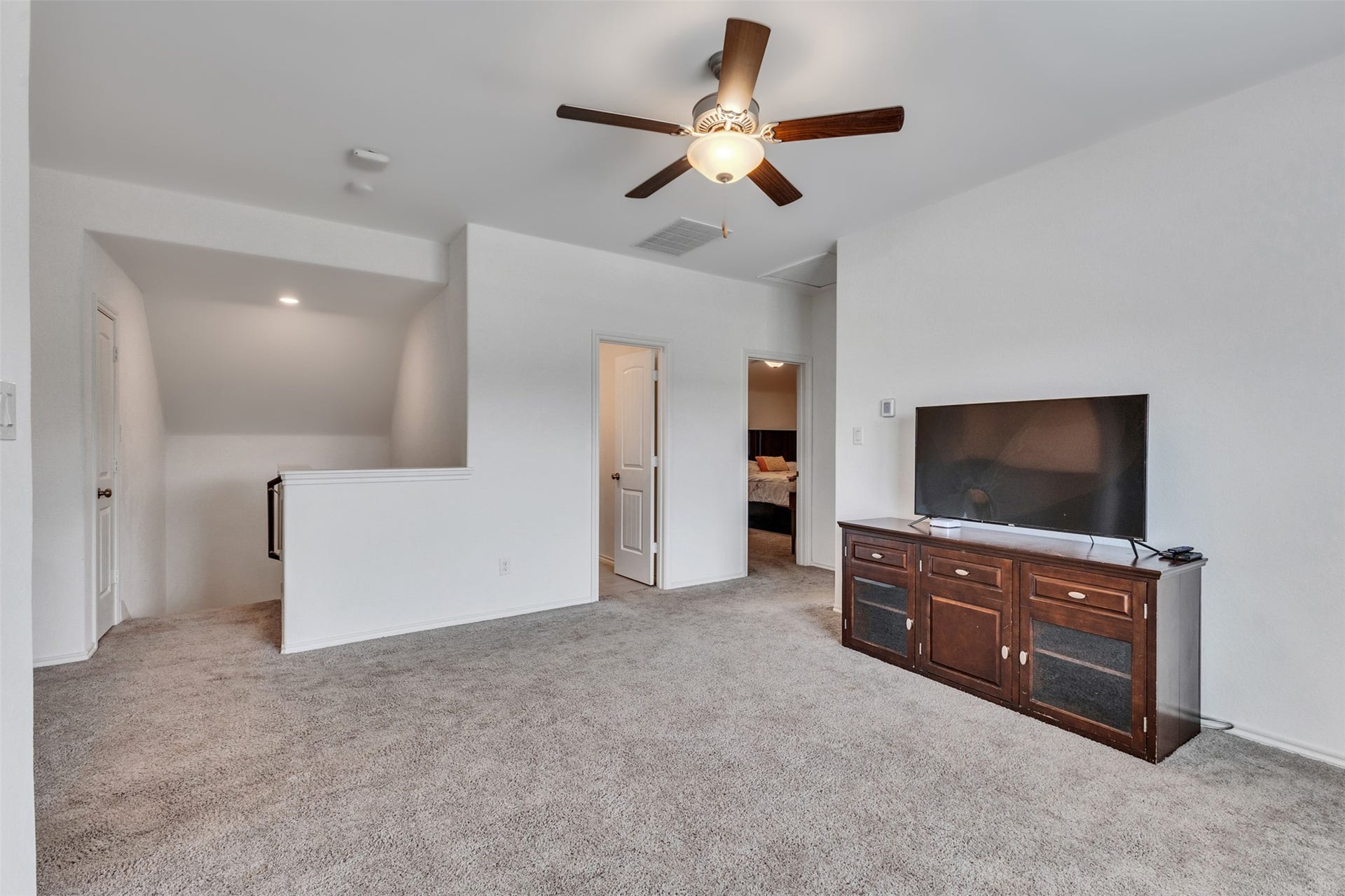 4341 Mocking Run Lane, Dickinson, TX 77539 An upstairs playroom adds opportunity for an extra living space or fun and games.