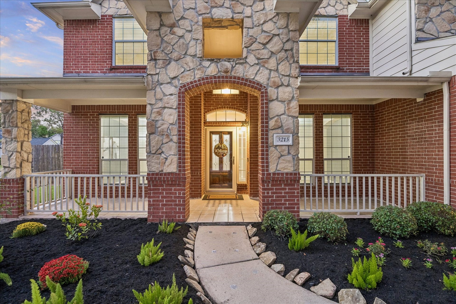 Freshly updated landscaping & truly beautiful curb appeal!
