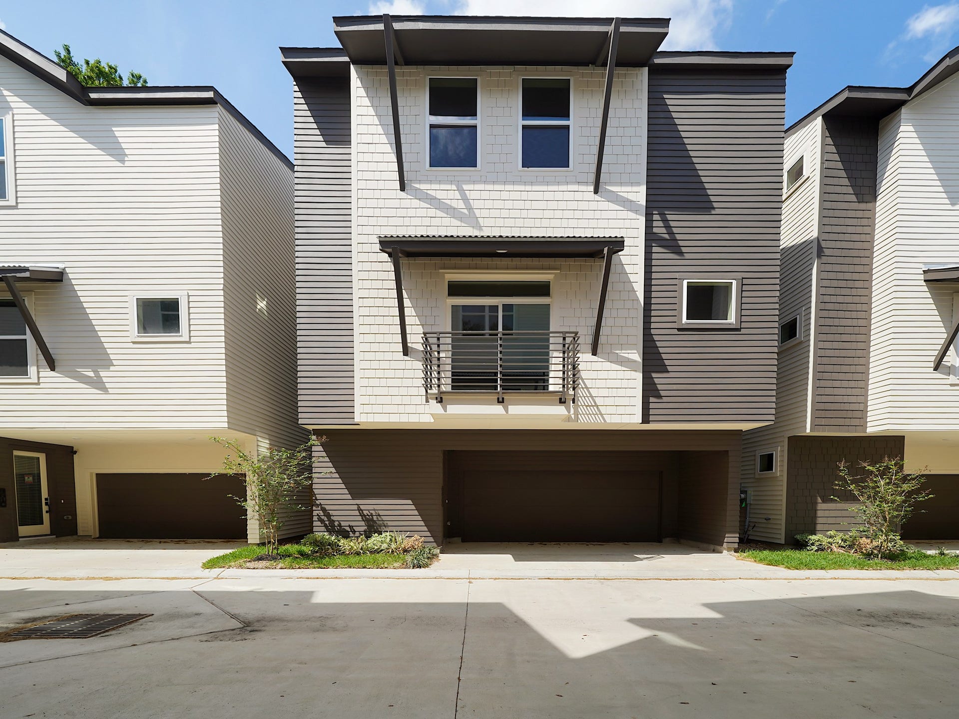 861 Rachel Street, #C, Houston, TX 77091 Discover modern living in this stylish three-story townhouse, featuring a striking mix of light and dark siding, a charming balcony, and a convenient double garage, all nestled within a meticulously maintained complex.