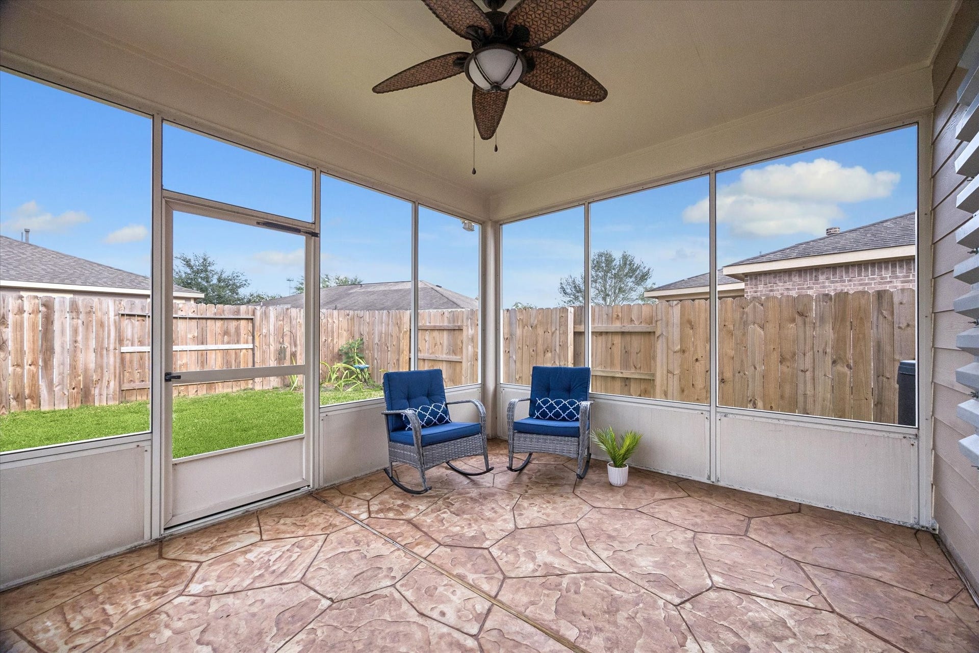 1624 Ponte Leone Lane, League City, TX 77573 Screened-in patio offers a comfortable extension of the home's living space.
