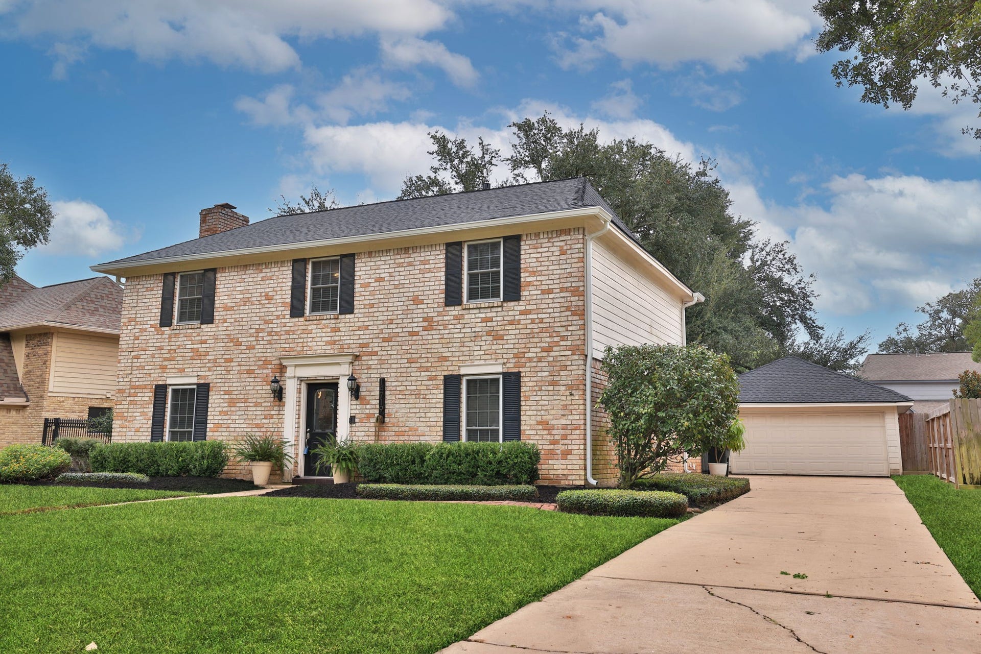 14719 Rio Pinar Drive, Houston, TX 77095 View of Driveway and Garage from Street