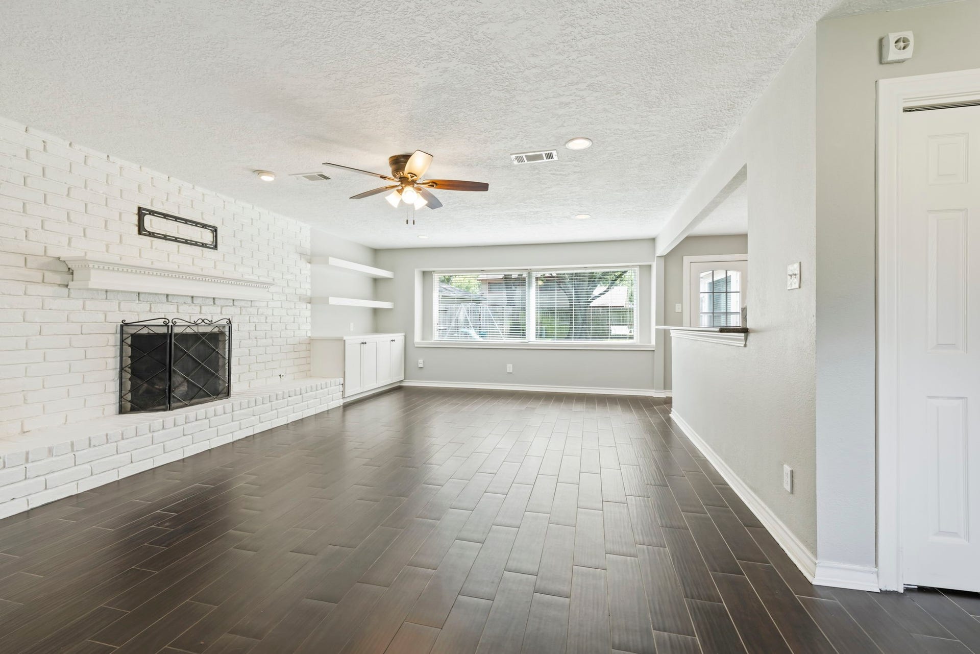 14719 Rio Pinar Drive, Houston, TX 77095 Spacious Living Area with Gas Log Fireplace