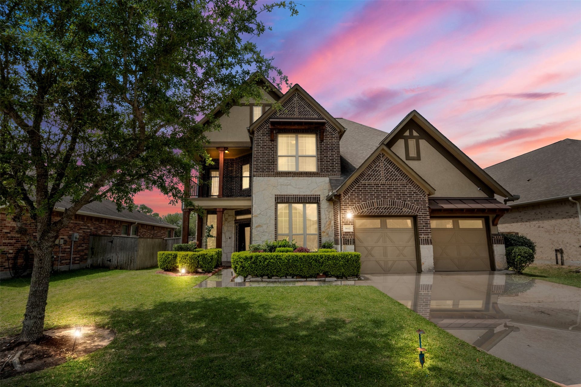 Welcome to this beautiful two-story home with a brick and stone facade and gorgeous curb appeal and a two-car garage.