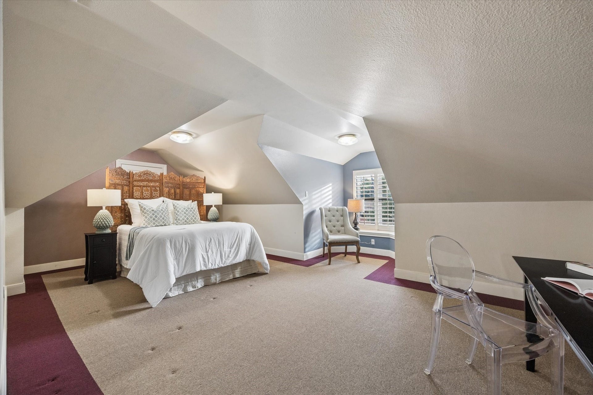 Additional space above the detached garage with endless possibilities. Ideal for a guest suite, home office or game room.