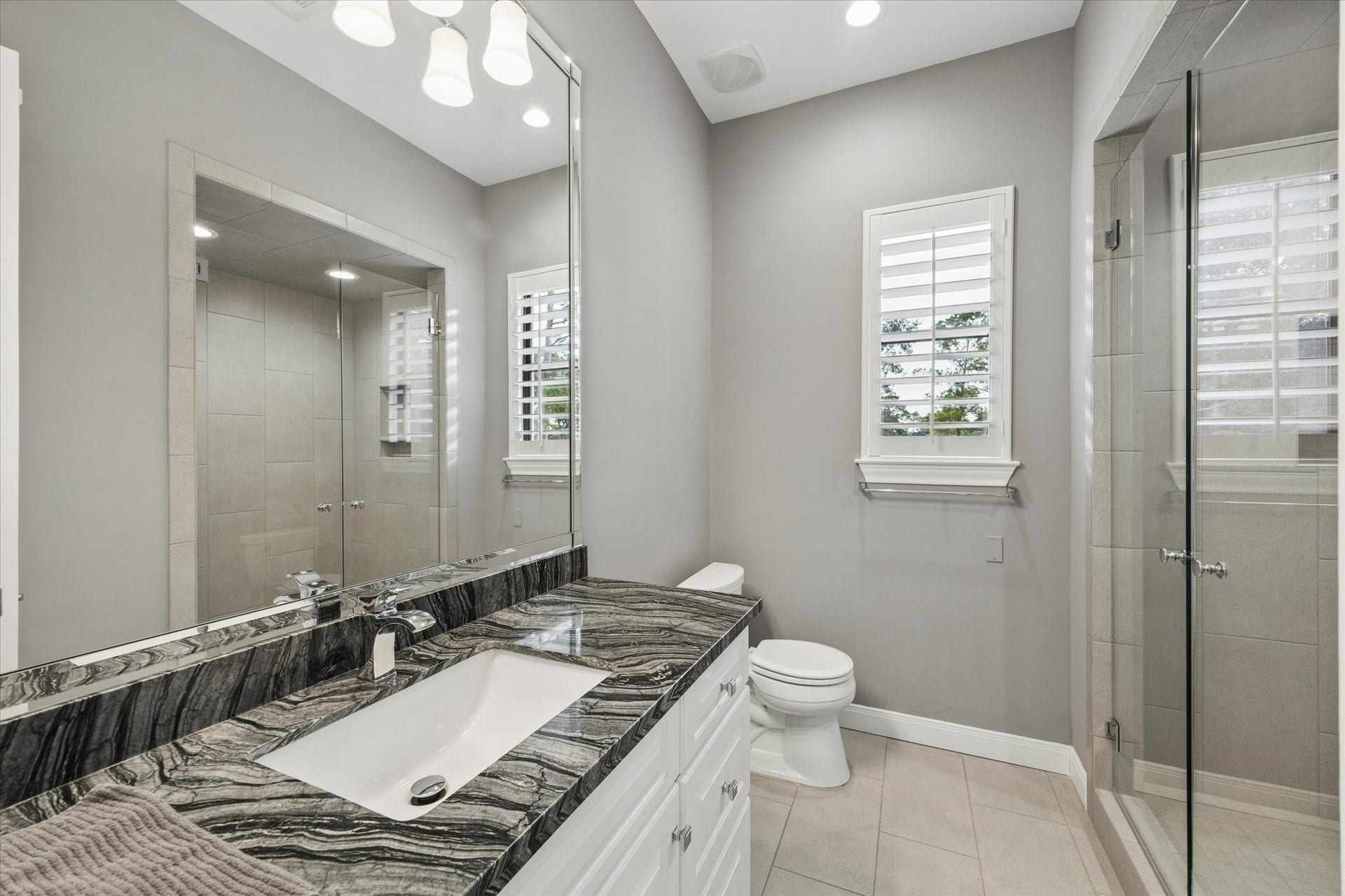 Full bath located in the pool house. 
Not pictured: additional powder bath with outdoor access for use during pool use.