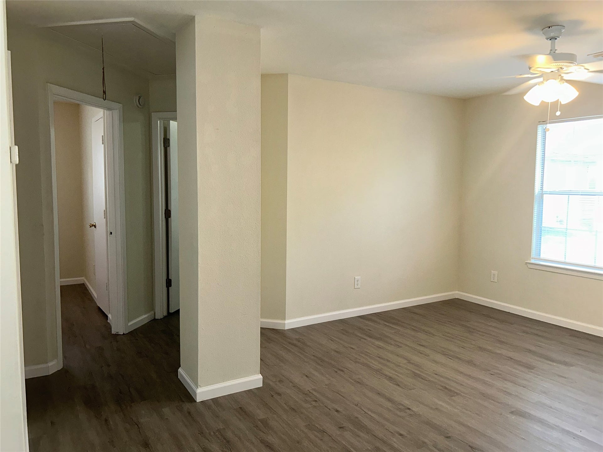 Living area opens to the bedroom hallway