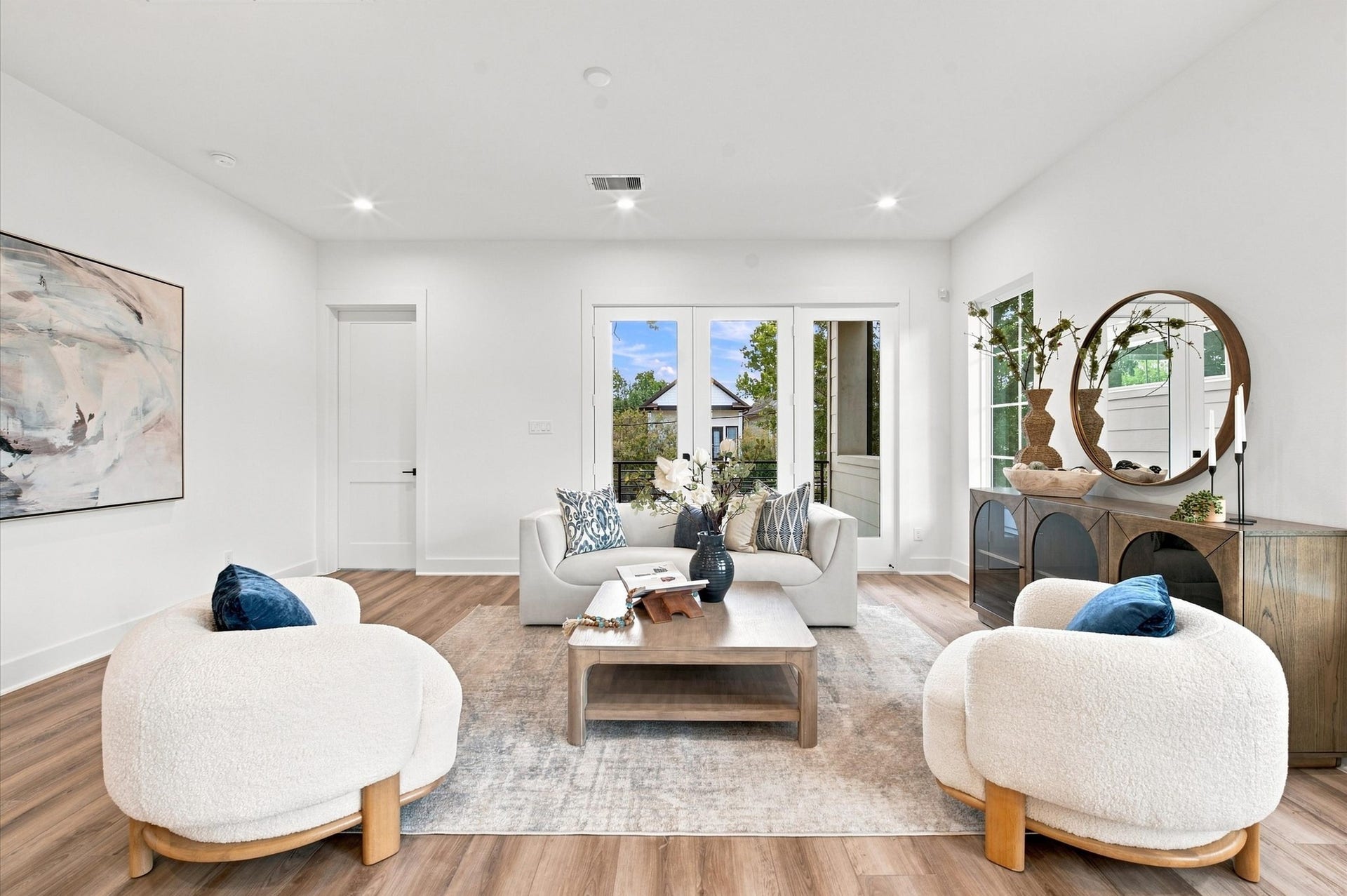 Living area with southern-facing balcony and study