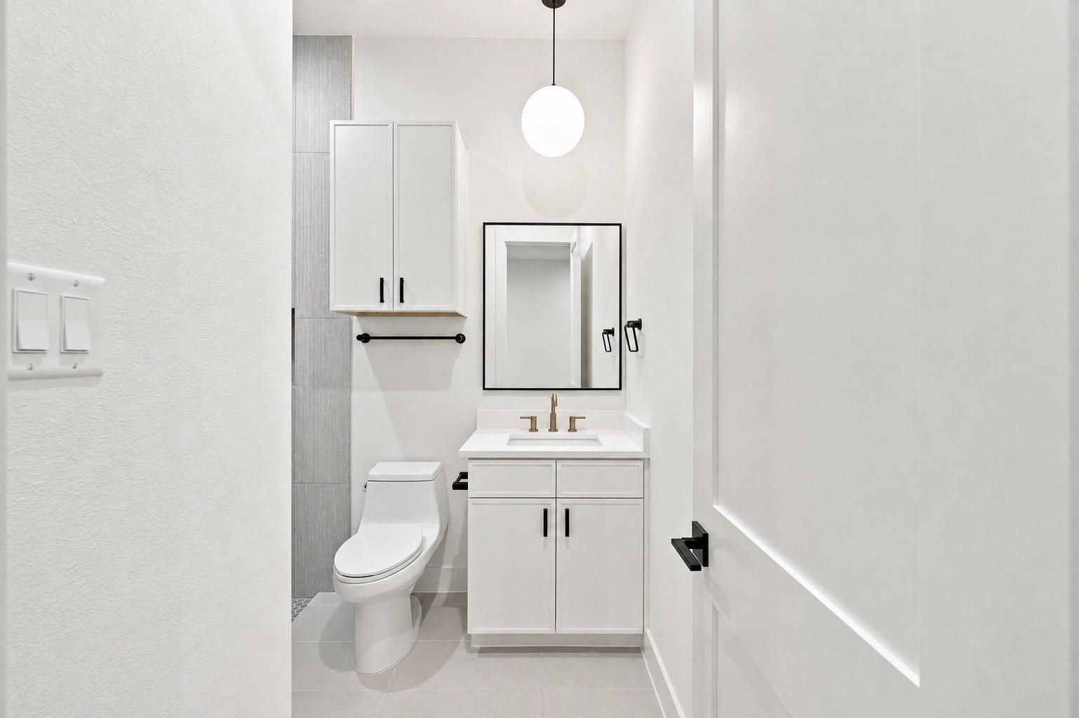 Vanity for bathroom on the first floor.