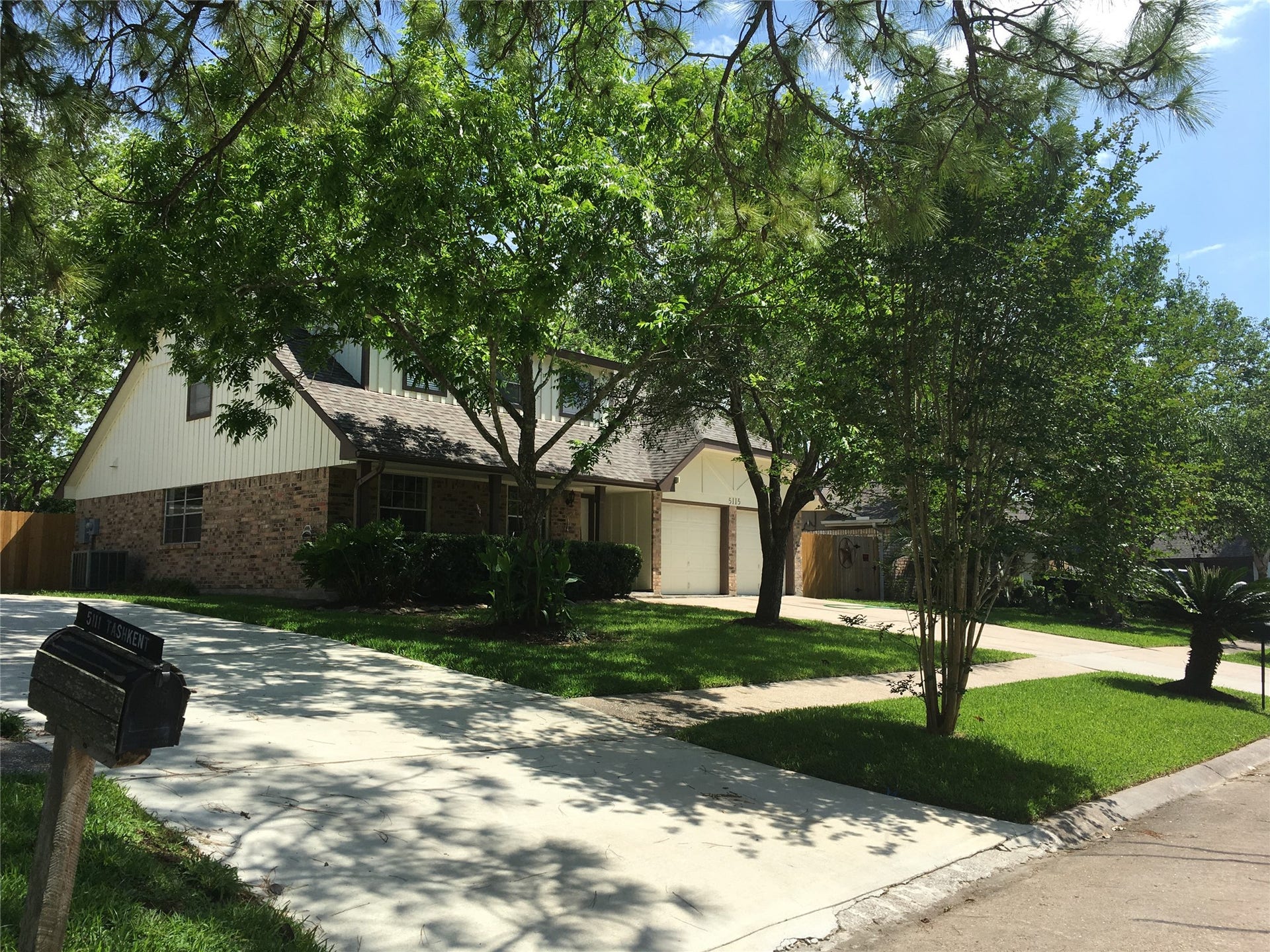 5115 Tashkent Drive, Friendswood, TX 77546 tree lined street
