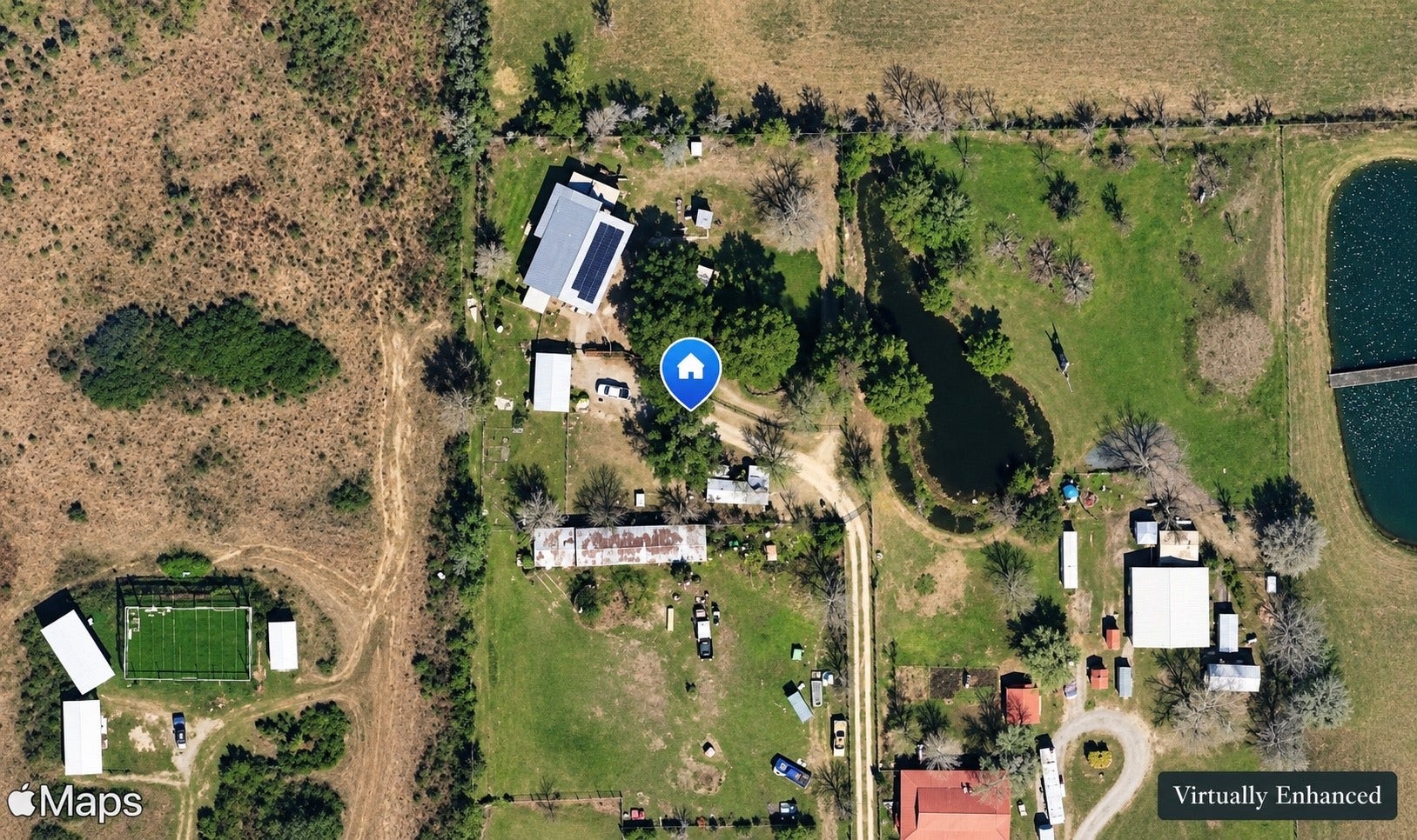 1325 E Stroker Road, Crosby, TX 77532 Over 1 acre of land with home and pond.
