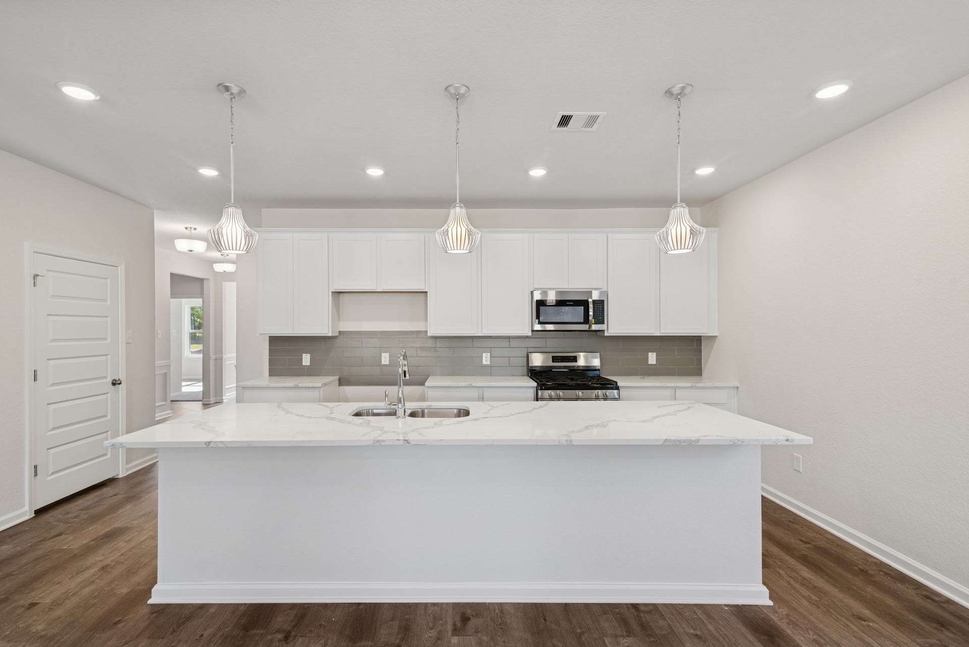 The Crawford- Kitchen. Home under construction, sample photo used for illustrative purposes only, colors and options will vary.