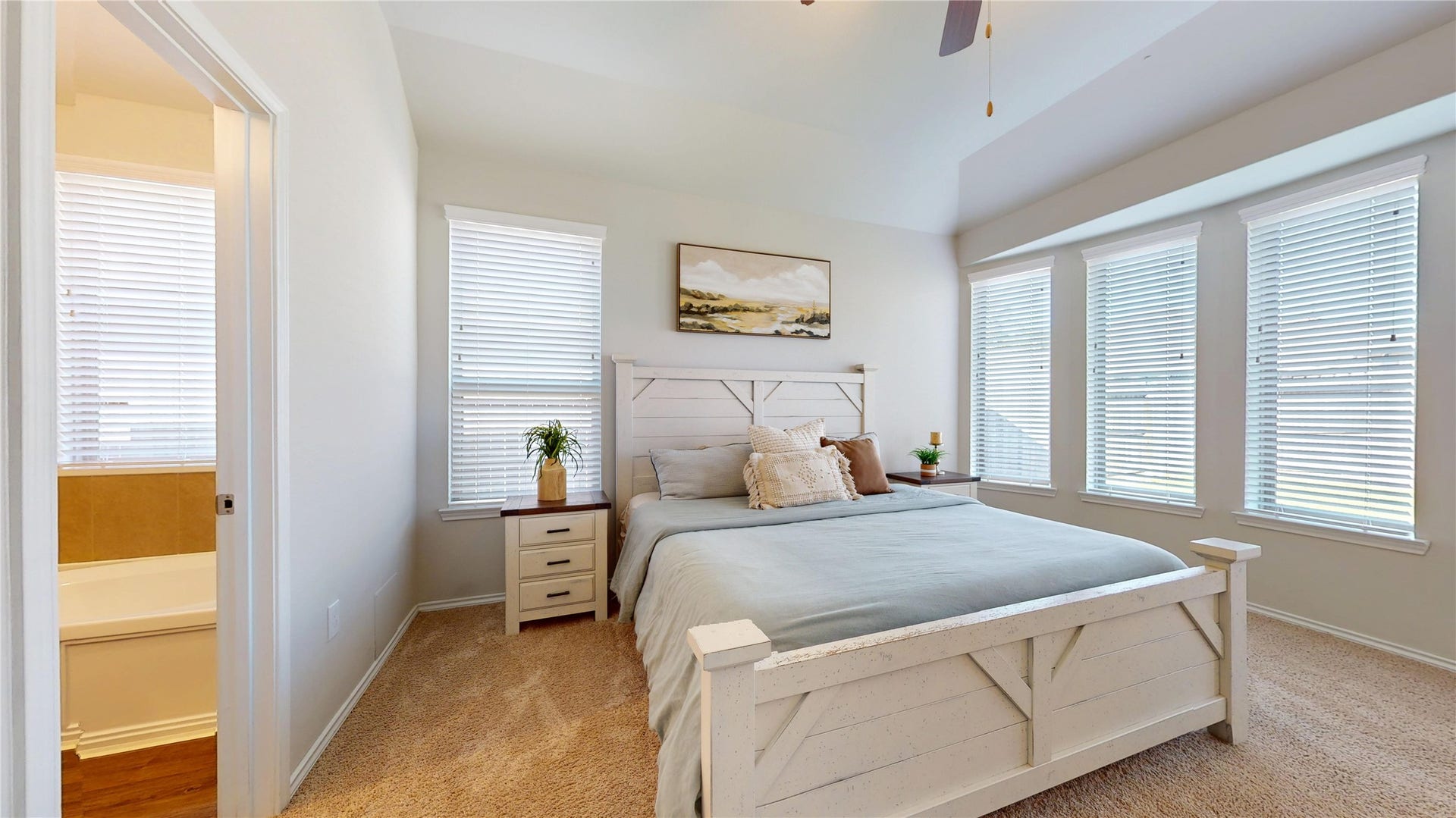 2926 Yaupon Grove Lane, Conroe, TX 77385 Lots of natural light with 5 windows on the bowed wall.