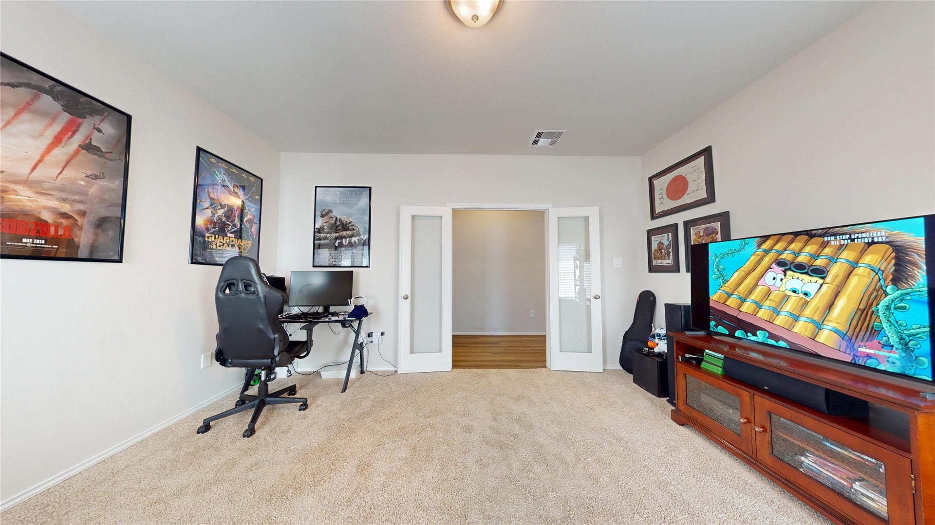 2926 Yaupon Grove Lane, Conroe, TX 77385 Approximate size of this Game room / Office is 11 x 14.