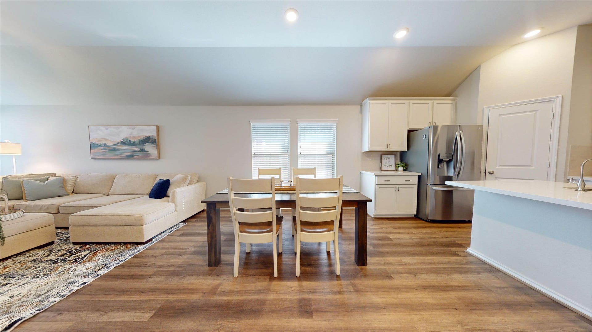 2926 Yaupon Grove Lane, Conroe, TX 77385 Open-concept living area flows seamlessly into the dining space and kitchen.