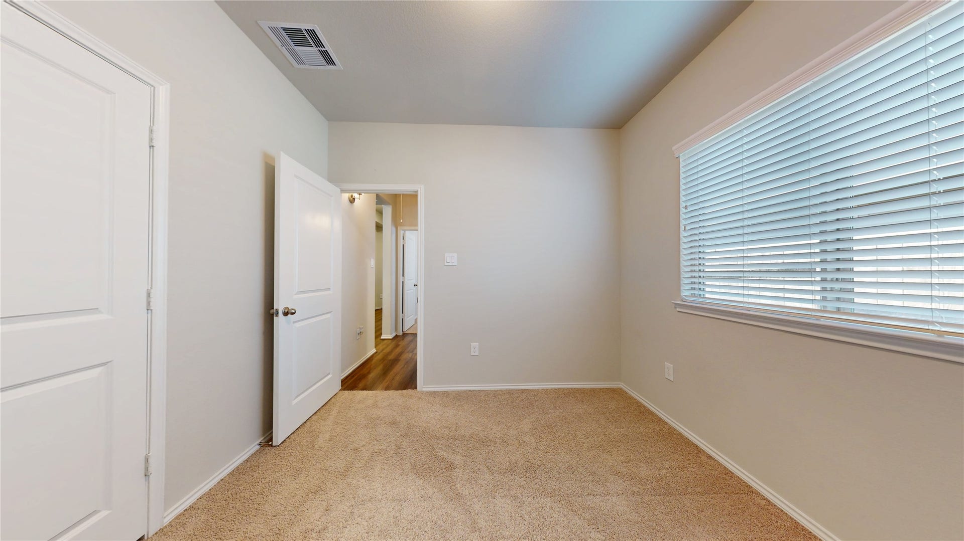 2926 Yaupon Grove Lane, Conroe, TX 77385 Another secondary bedroom, this one has a double door opening closet. Note there is a linen closet located directly off this room.
