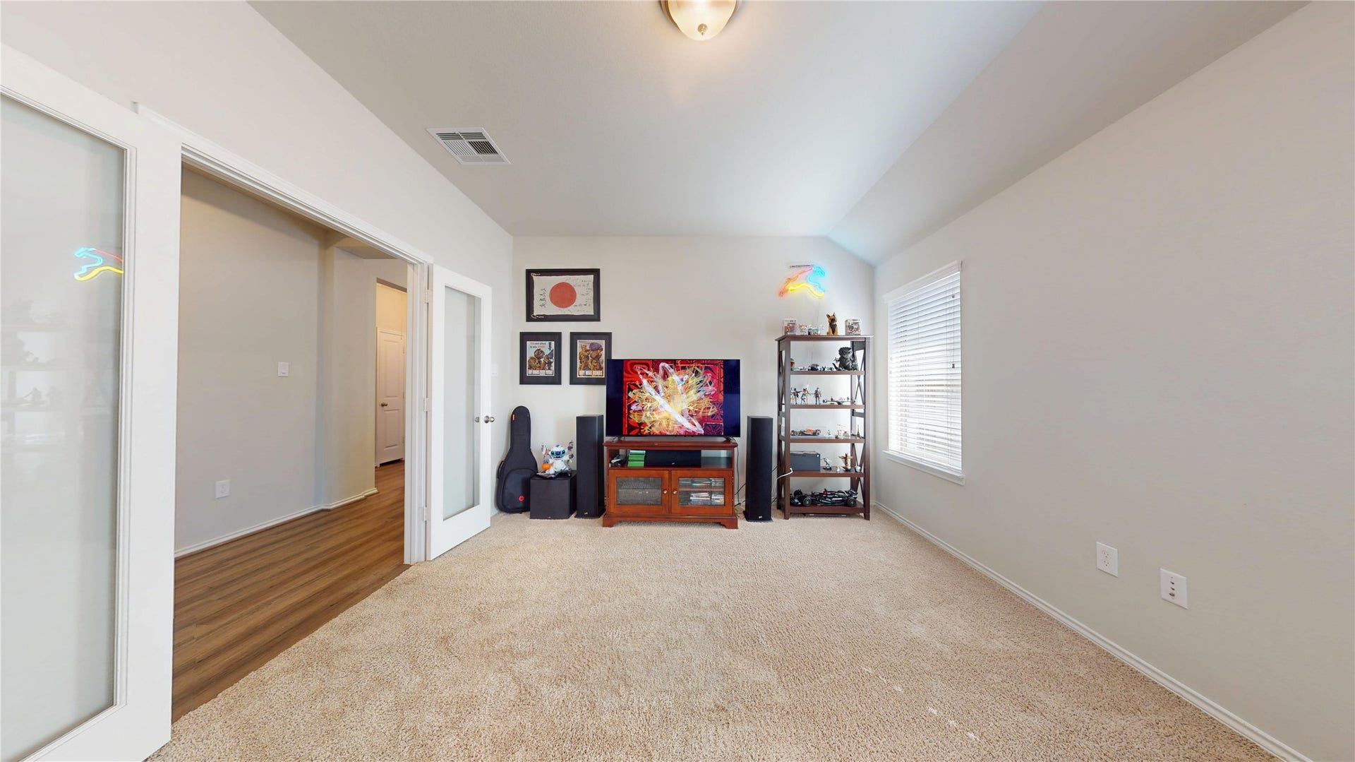 2926 Yaupon Grove Lane, Conroe, TX 77385 Game room / Office located off foyer hallway with French doors.