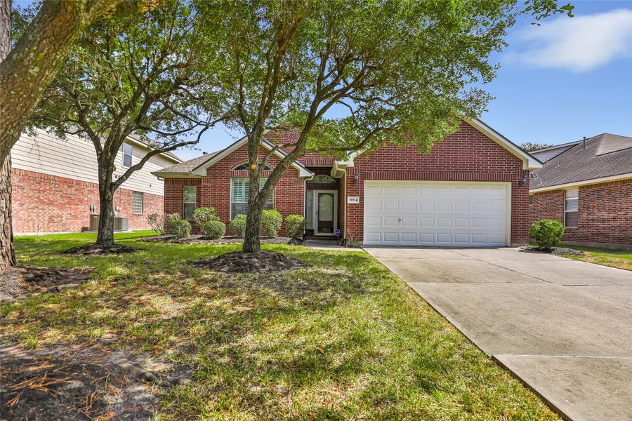 Property photo for 26924 Manor Falls Drive, Kingwood, TX